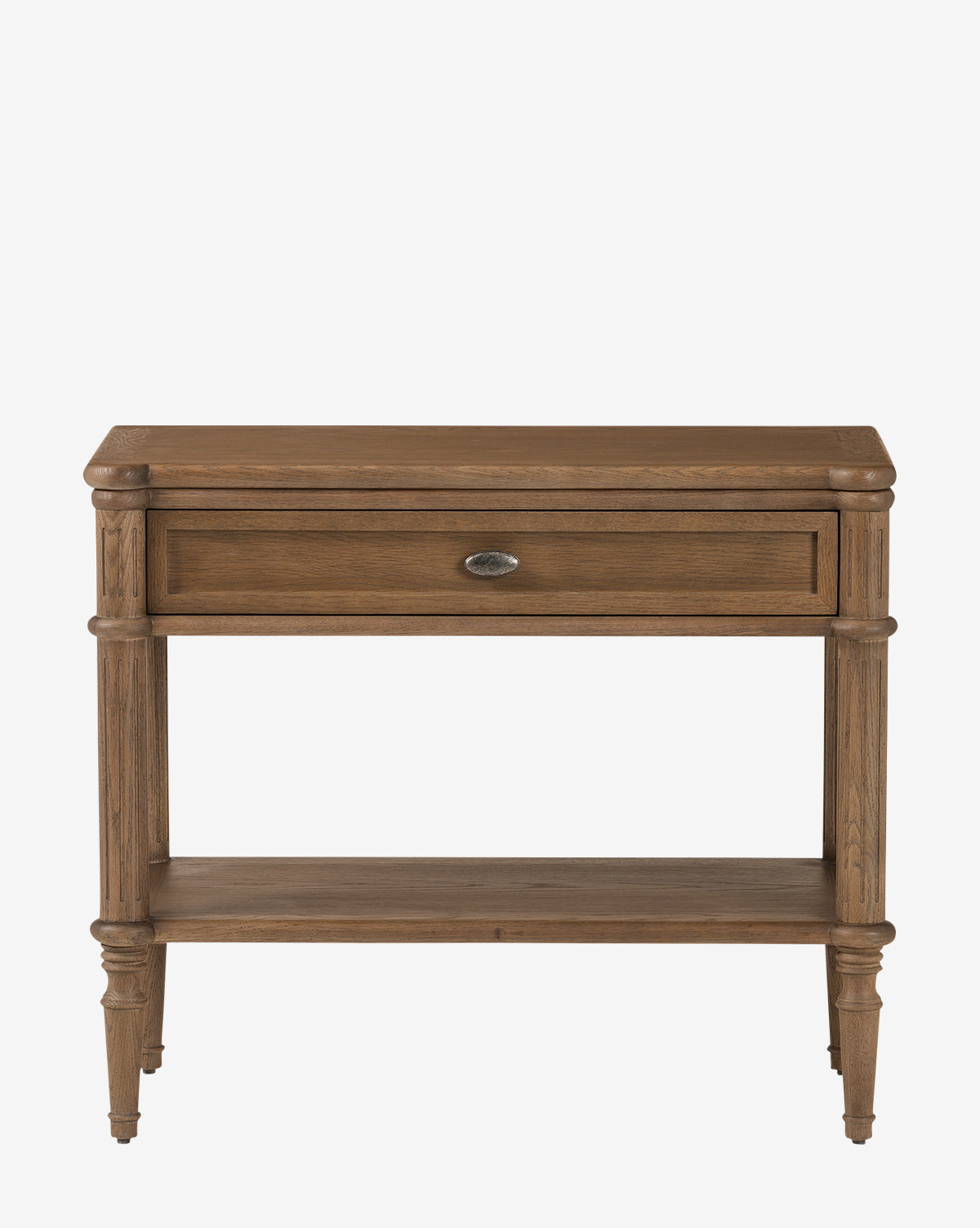 A wooden console table with a round metal handle, open shelf, and tapered legs, showcasing a natural finish and classic design that pairs perfectly with the matching Humphrey Nightstand in traditional bedrooms, by McGee & Co.
