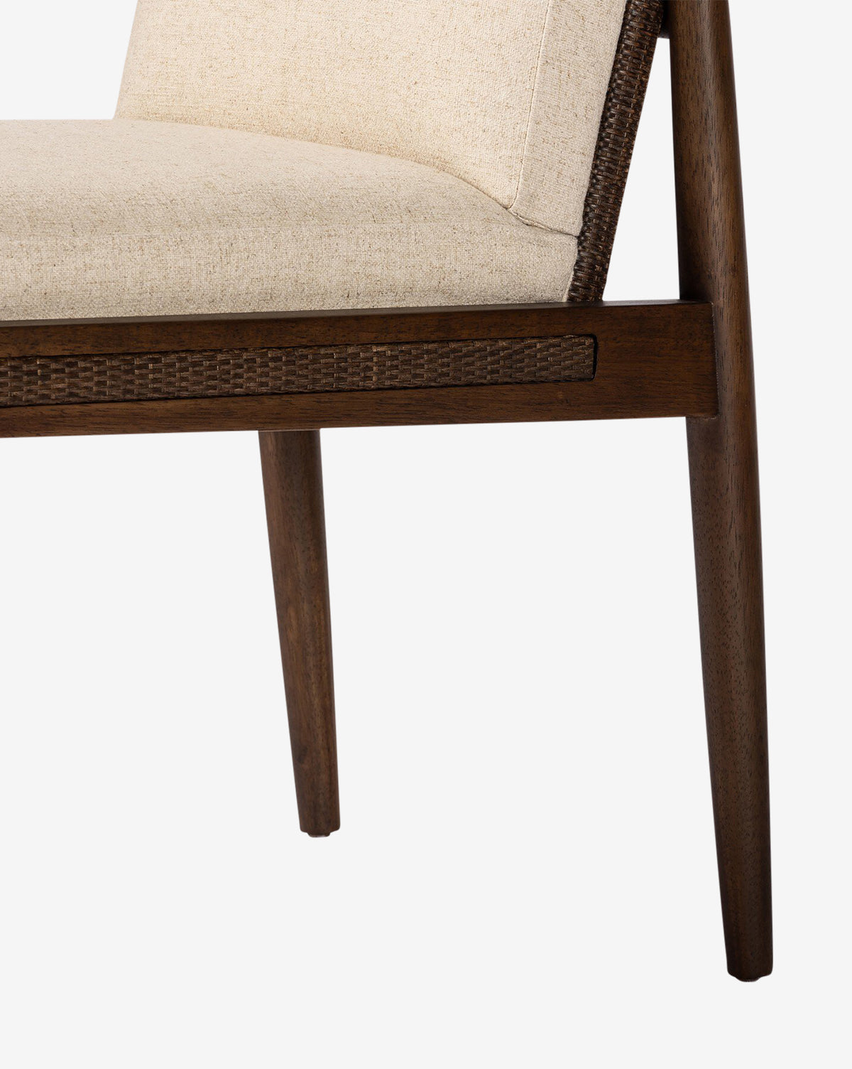 The Hurley Dining Chair features a beige cushioned seat in performance upholstery, paired with dark wooden legs and frame, shown against a white backdrop, by McGee & Co.