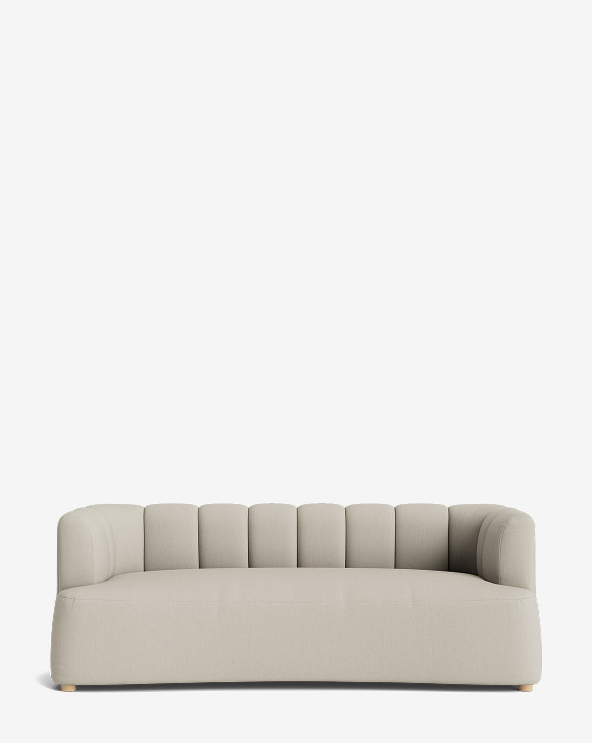 The Ines Sofa 90 is a modern light gray velvet sofa with rounded edges, low arms, and a vertically channeled backrest. Set against a plain white background, it features elegant wooden feet for a minimalist look by McGee & Co.