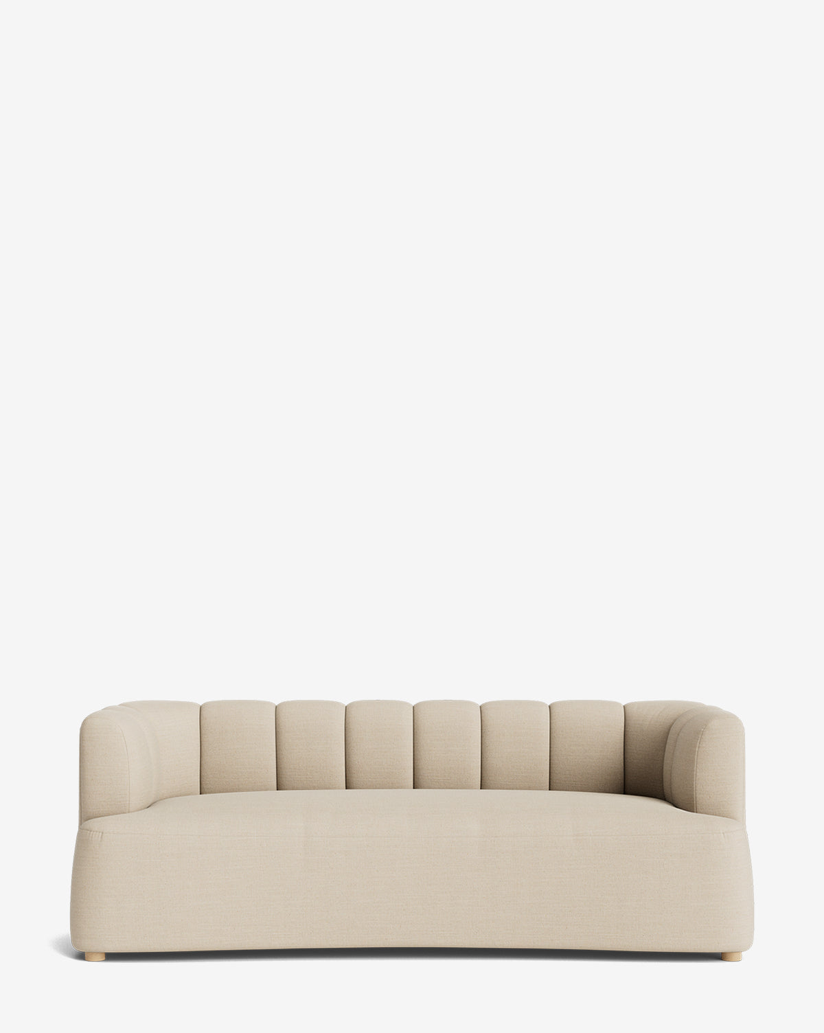 The Ines Sofa 90 is a modern beige velvet sofa with rounded edges and a low backrest featuring vertical tufting, displayed against a plain white background by McGee & Co.