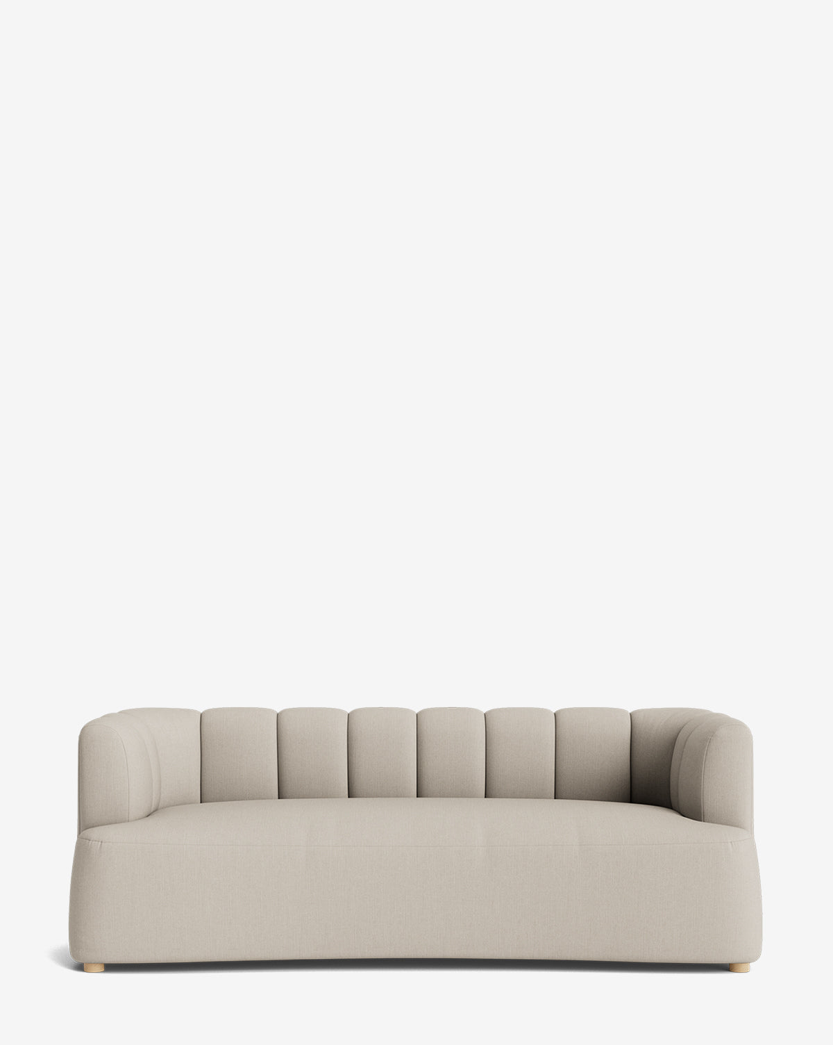 The Ines Sofa 90 is a modern beige velvet sofa with rounded arms and a low backrest, featuring vertical tufted detailing, set against a plain white background by McGee & Co.