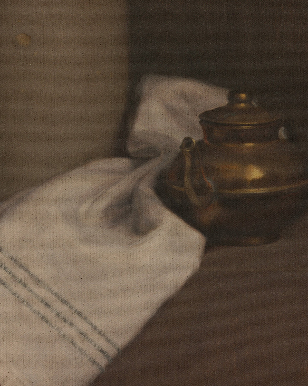 Iron and Brass by Bethany Joseph features a brass teapot on a dark surface beside a white cloth with blue stripes, elegantly captured in layered oil paint and presented as handmade wall art in a Brimfield black frame, by McGee & Co.