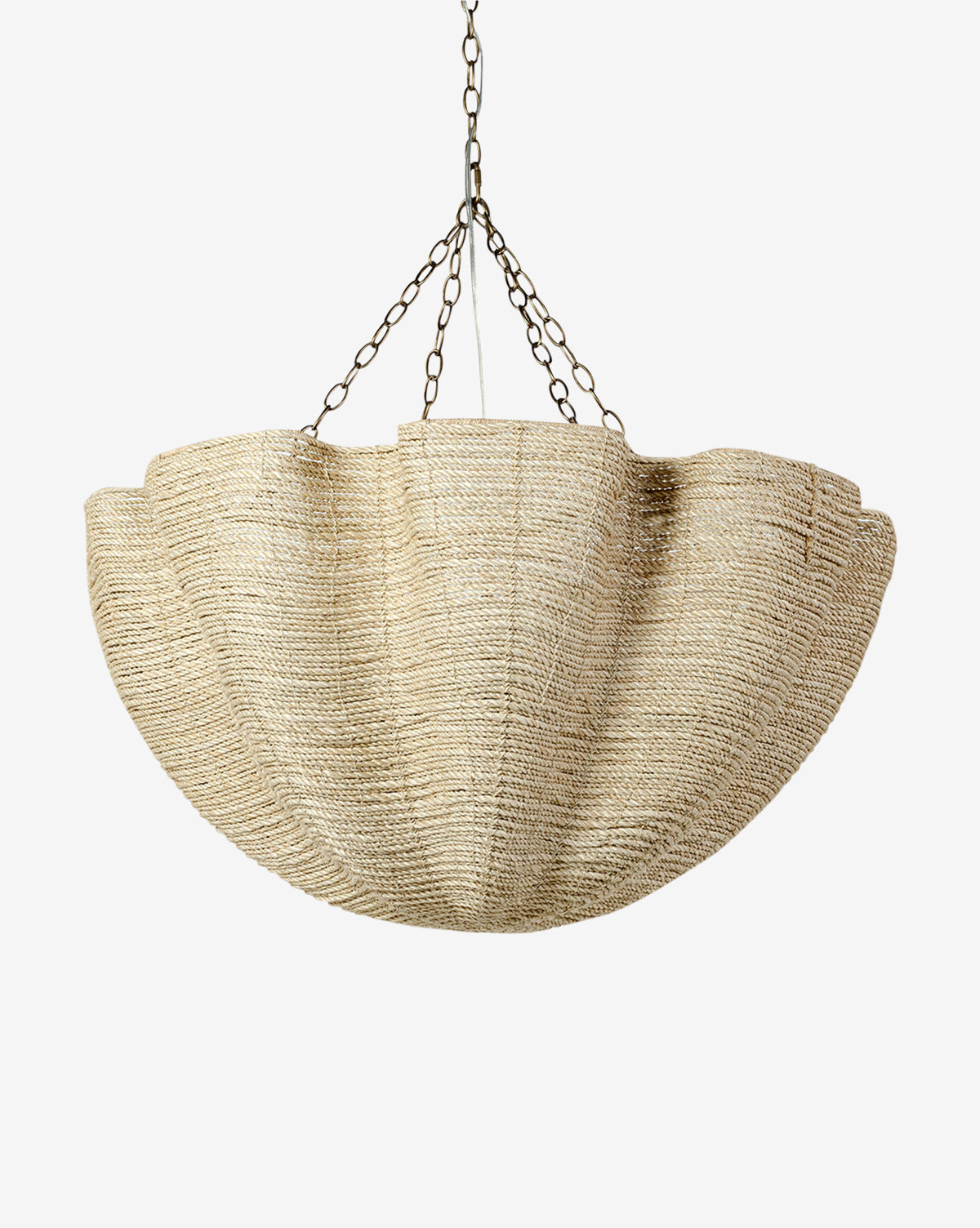 The Isla Chandelier by Palecek features organic pleats and a scalloped, natural woven shade, suspended by three metal chains, shown against a plain white background. McGee & Co.