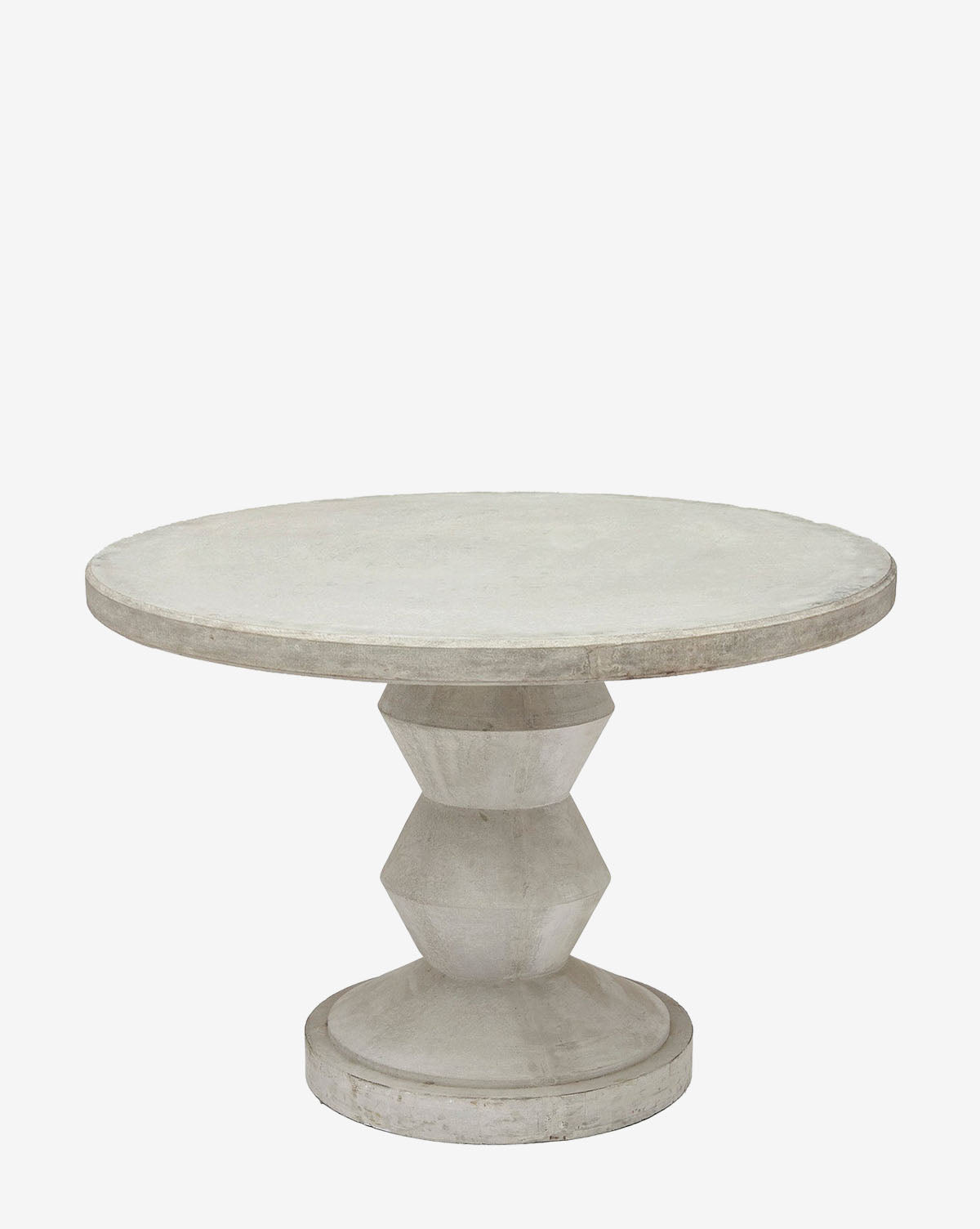 The Jessa Outdoor Dining Table features a round, light gray reconstituted stone top with a thick geometric pedestal base and smooth surface—ideal as modern outdoor furniture against a white backdrop, by McGee & Co.