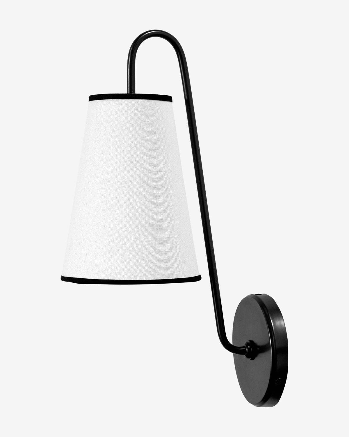 The Jonas Sconce by Makerspalm is a modern black wall sconce with a curved arm and a white linen, cone-shaped shade, shown against a plain light background. McGee & Co.