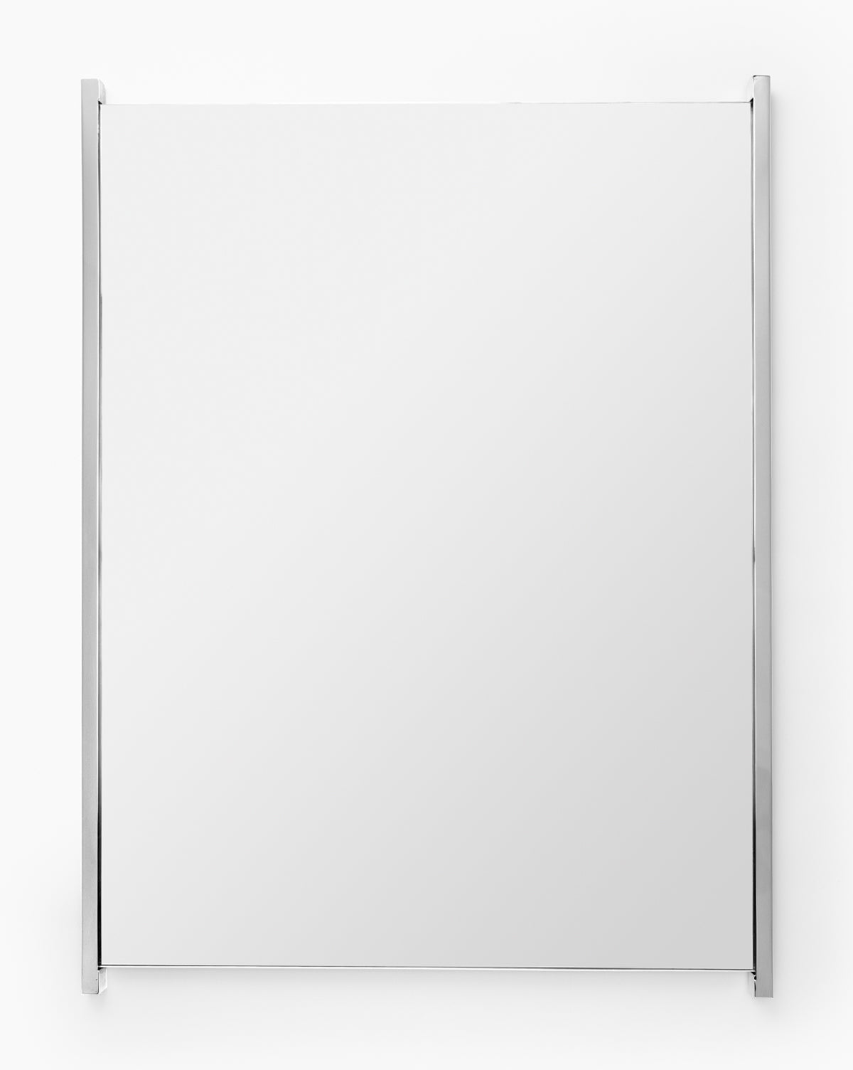 The Julie Mirror, featuring a thin polished nickel frame, stands out with its square shape against a plain white background, by McGee & Co.