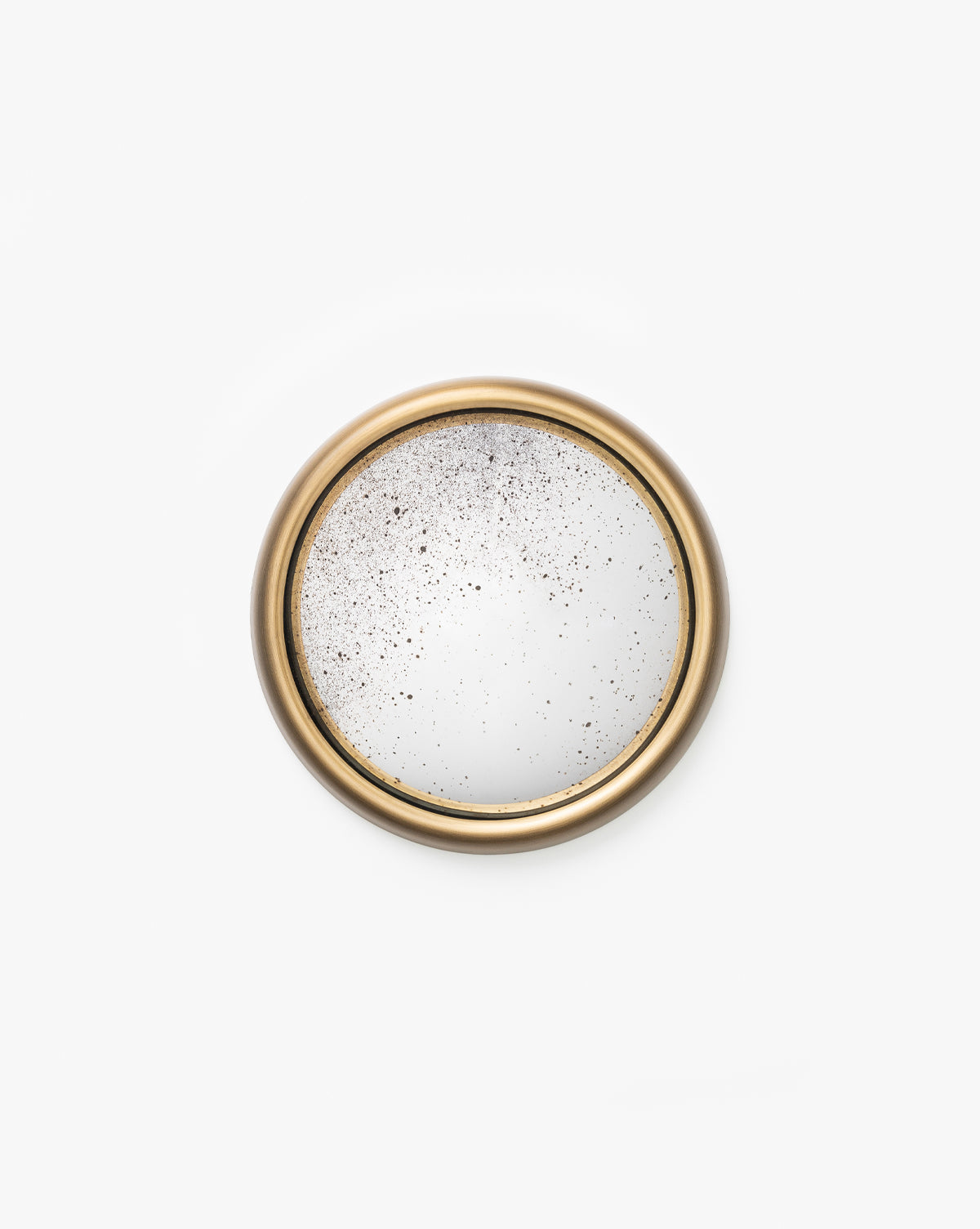 The Juliette Convex Antiqued Mirror features a round silhouette with a vintage brass frame and a distressed, speckled surface—ideal for lovers of antique-inspired decor, by McGee & Co.