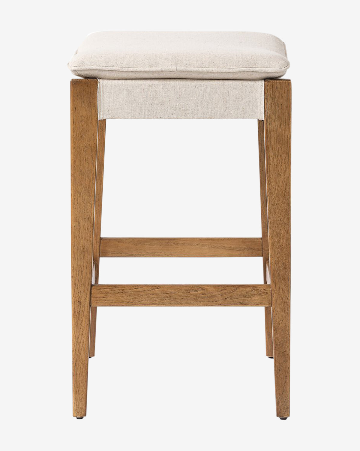 The Kaelith Counter Stool by Four Hands features solid oak construction, straight legs with horizontal supports, and a light cushioned seat—an ideal match for your kitchen counter. Shown front-facing against a white background. McGee & Co.