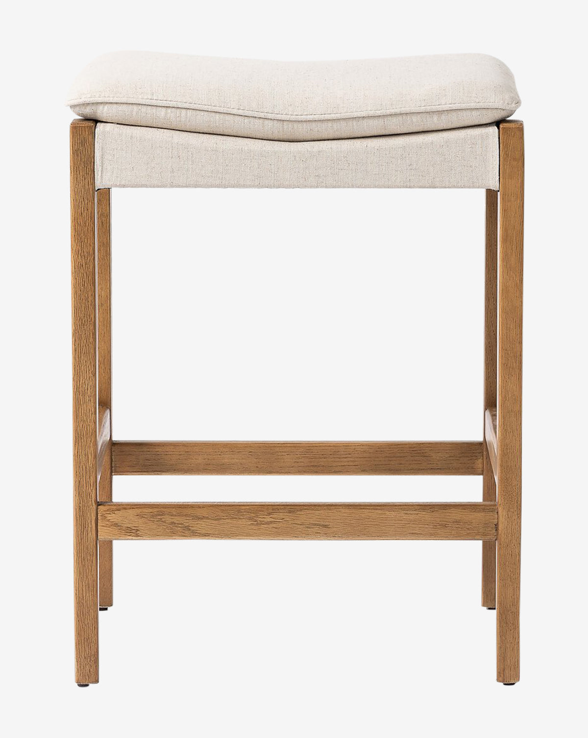 The Kaelith Counter Stool by Four Hands features a solid oak frame, a light cushioned seat, and a simple rectangular design, shown from the front against a plain white background. McGee & Co.