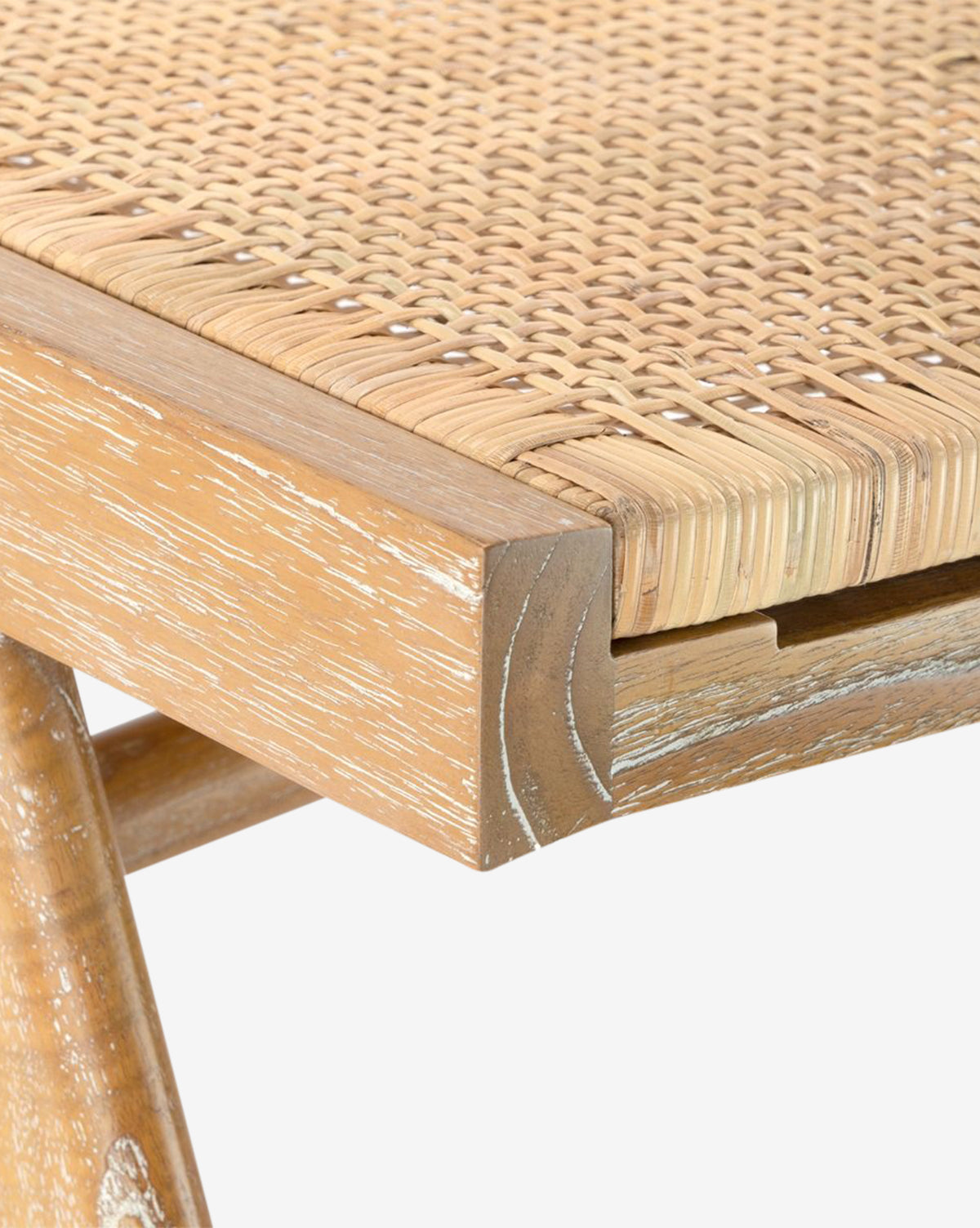 Close-up of the Villa & House, LLC Kareen Stool, featuring rich mahogany wood grain, precise corner joinery, and a hand-woven cane seat that showcases the stools detailed craftsmanship and natural woven texture. McGee & Co.