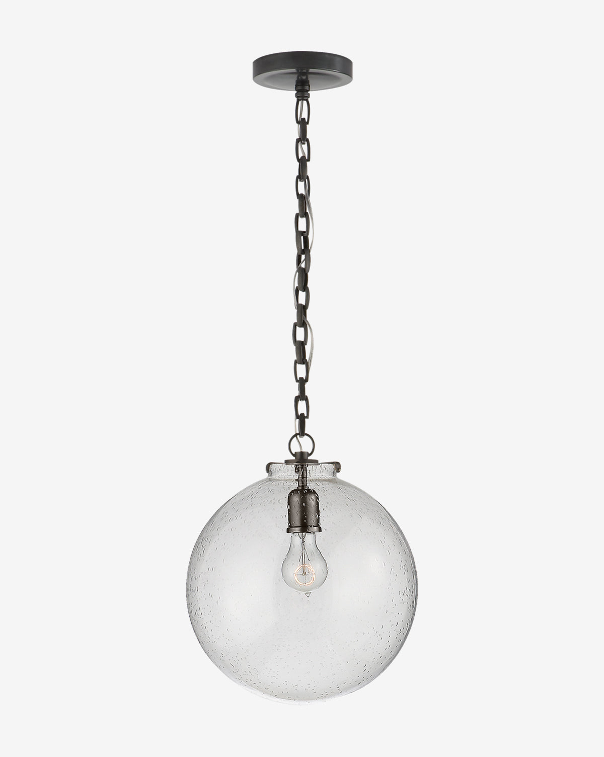 The Katie Globe Pendant from Visual Comfort & Co. Signature features a clear round glass globe suspended by a dark metal chain, showcasing the bulb inside for a timeless, classic style. McGee & Co.
