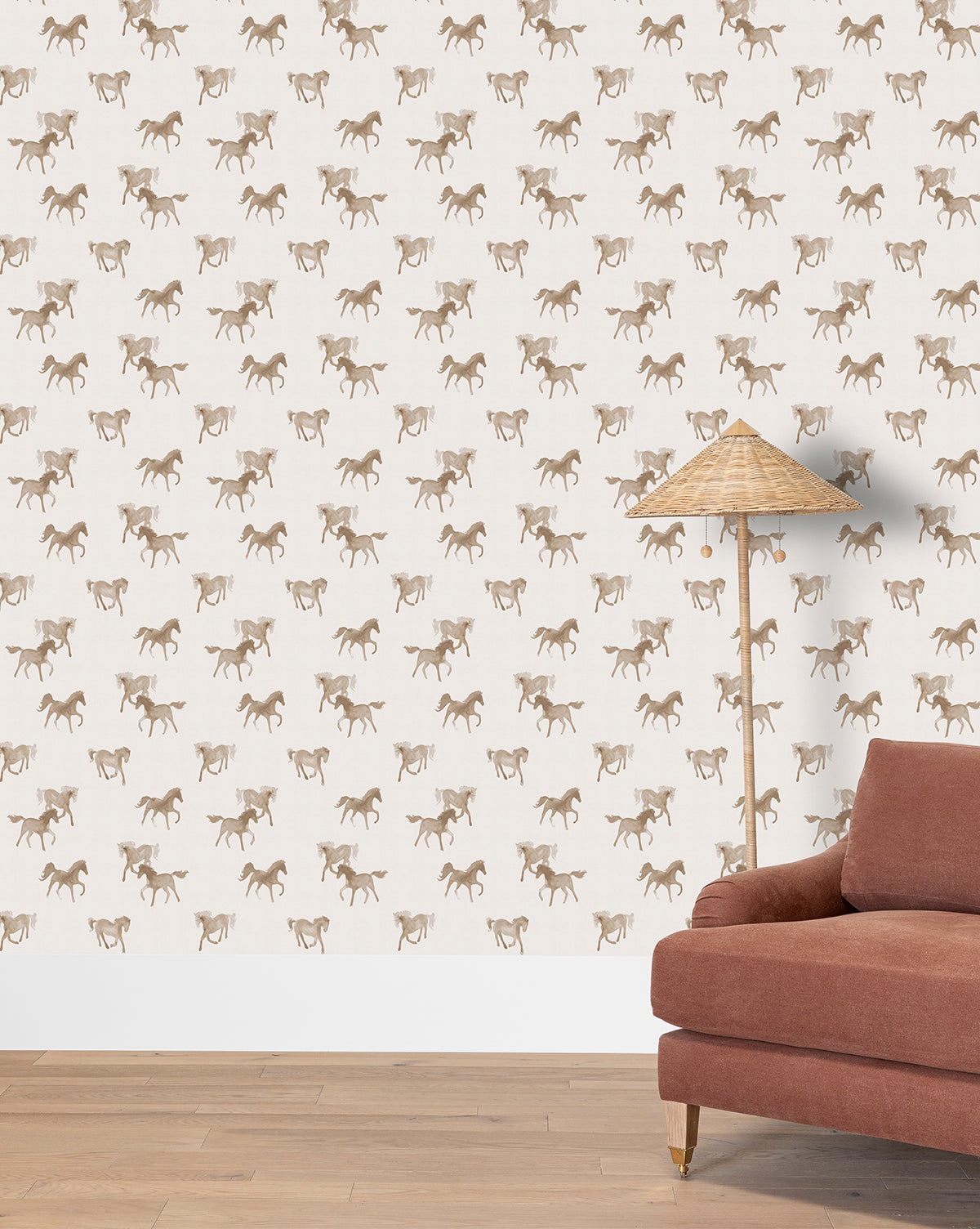 Galloping horses in a watercolor style bring movement and warmth in taupe and beige shades to this wallpaper by McGee & Co.