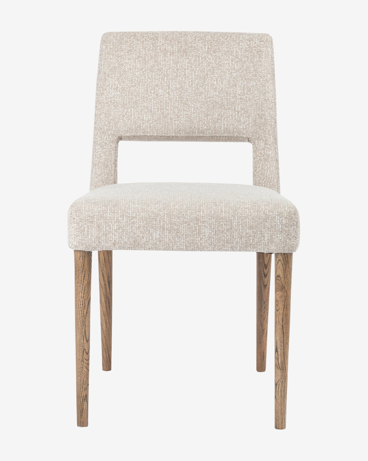 The Kiernan Dining Chair is a modern beige upholstered seat with a horizontal open lower back, supported by four straight light wood legs, shown on a plain white background, by McGee & Co.