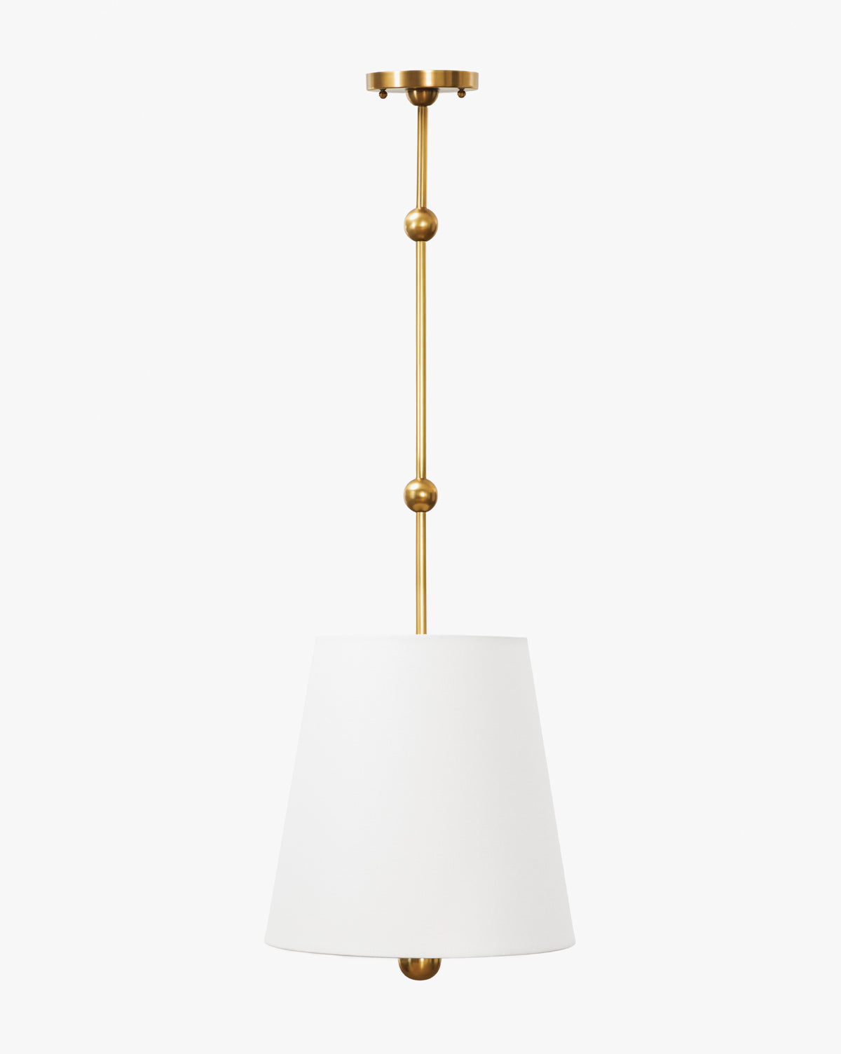 The Kipling Pendant showcases a gold metal rod with decorative spheres, an elegant white linen shade, and a coordinating gold ceiling mount, adding modern charm to any space, by McGee & Co.