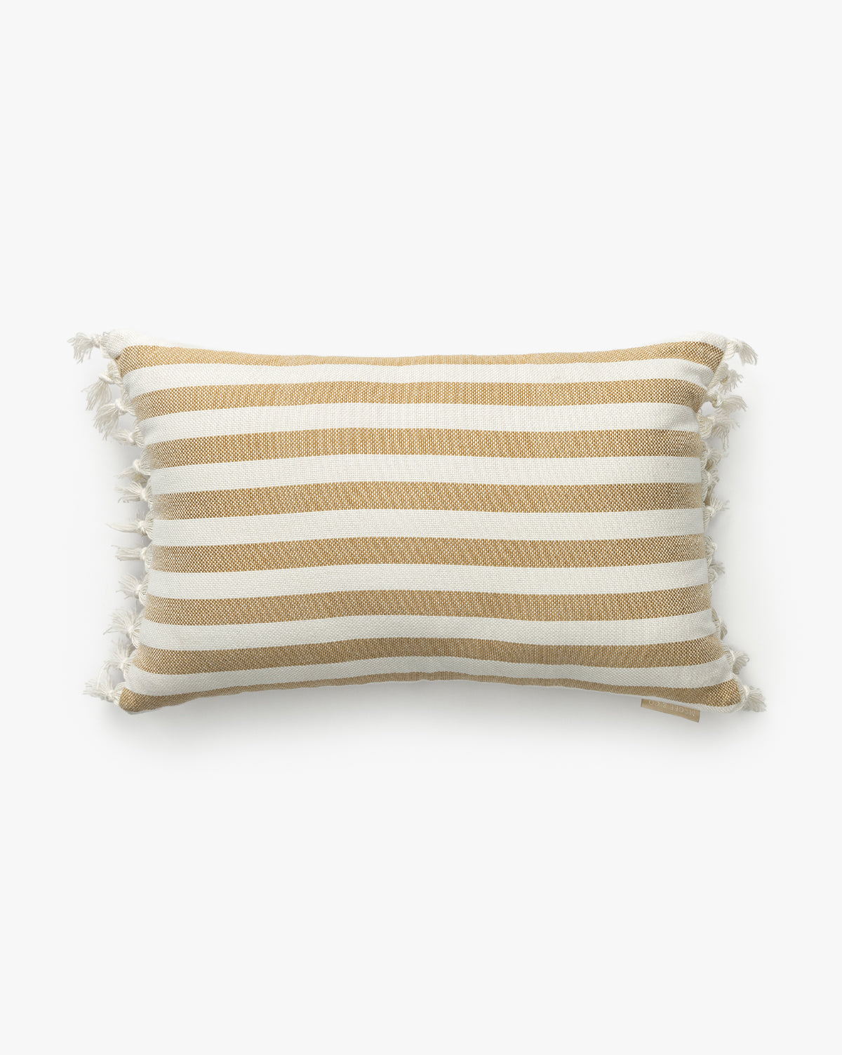 The Kirby Striped Indoor/Outdoor Pillow features horizontal tan and white stripes with white tassels on each corner, adding a durable and stylish accent to any space, by McGee & Co.