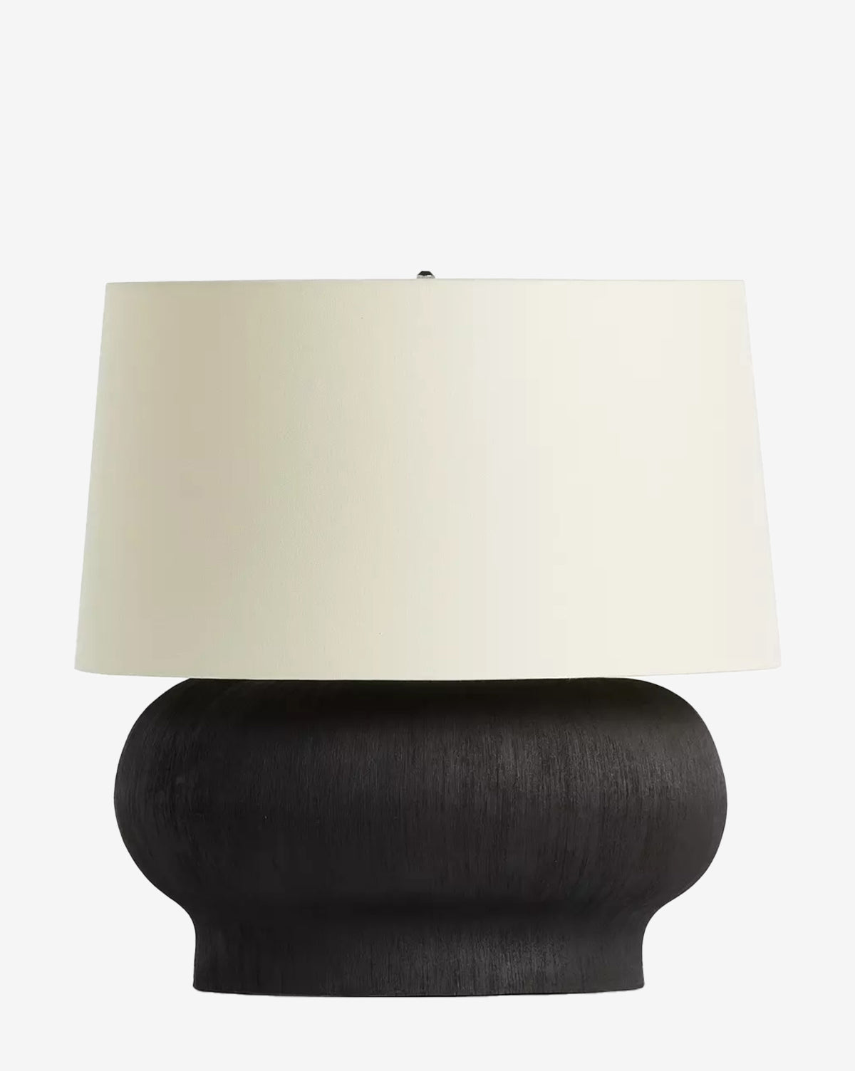 The Kragen Table Lamp by Four Hands features a wide, rounded black ceramic base and an ivory linen shade, creating a modern decorative accent that stands out against any plain white background by McGee & Co.
