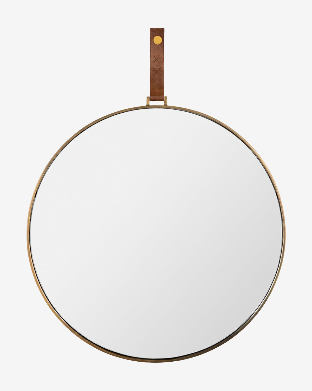 The Laila Circle Mirror boasts a slim gold frame and a chic leather hanger with brass hardware, making it a sophisticated accent on any white wall, by McGee & Co.