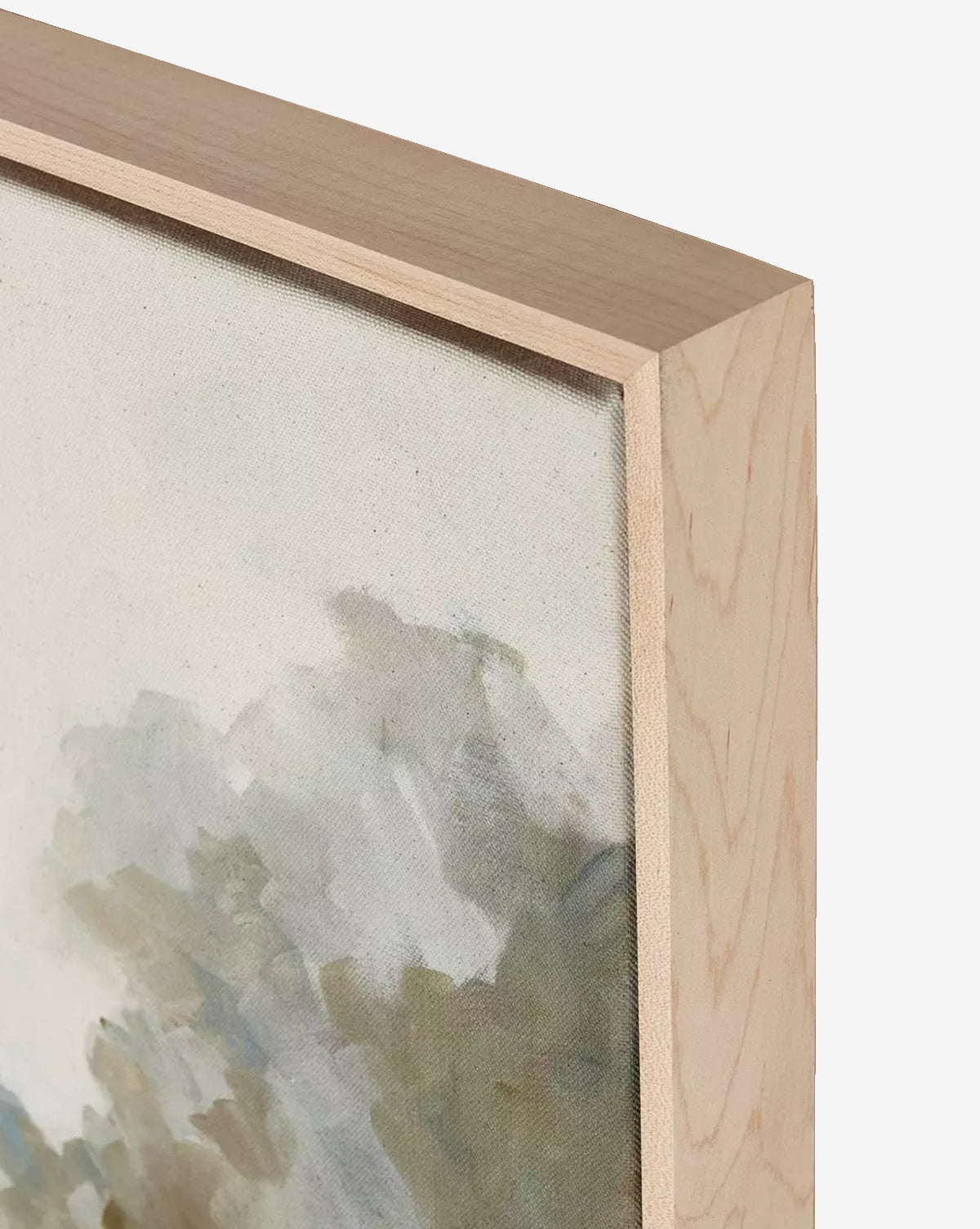 Close-up of the top right corner of Lake by Lauren Fuhr, a giclee print in a light maple floater frame, showcasing abstract brushstrokes in muted green, grey, and beige on white.