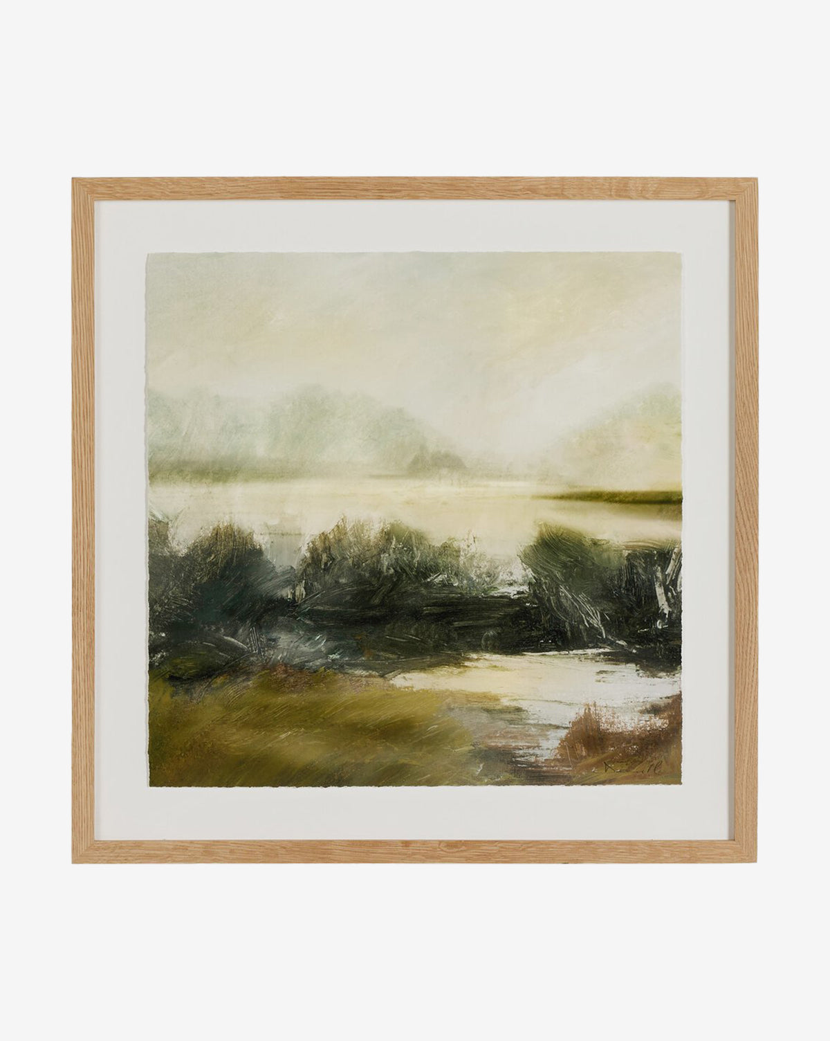 Lake House by Dan Hobday: a framed fine art painting in light wood, featuring abstract green and brown shrubbery, water, and hazy hills beneath a pale sky. Its serene design evokes the tranquil vibe of a lakeside retreat, by McGee & Co.