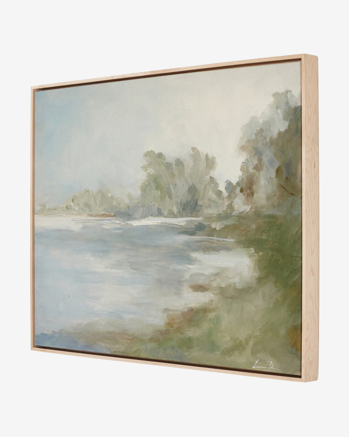 Lake by Lauren Fuhr: A framed painting of a serene lakeshore with soft colors, featuring trees and greenery along the water under a cloudy sky, set in a stylish maple floater frame.