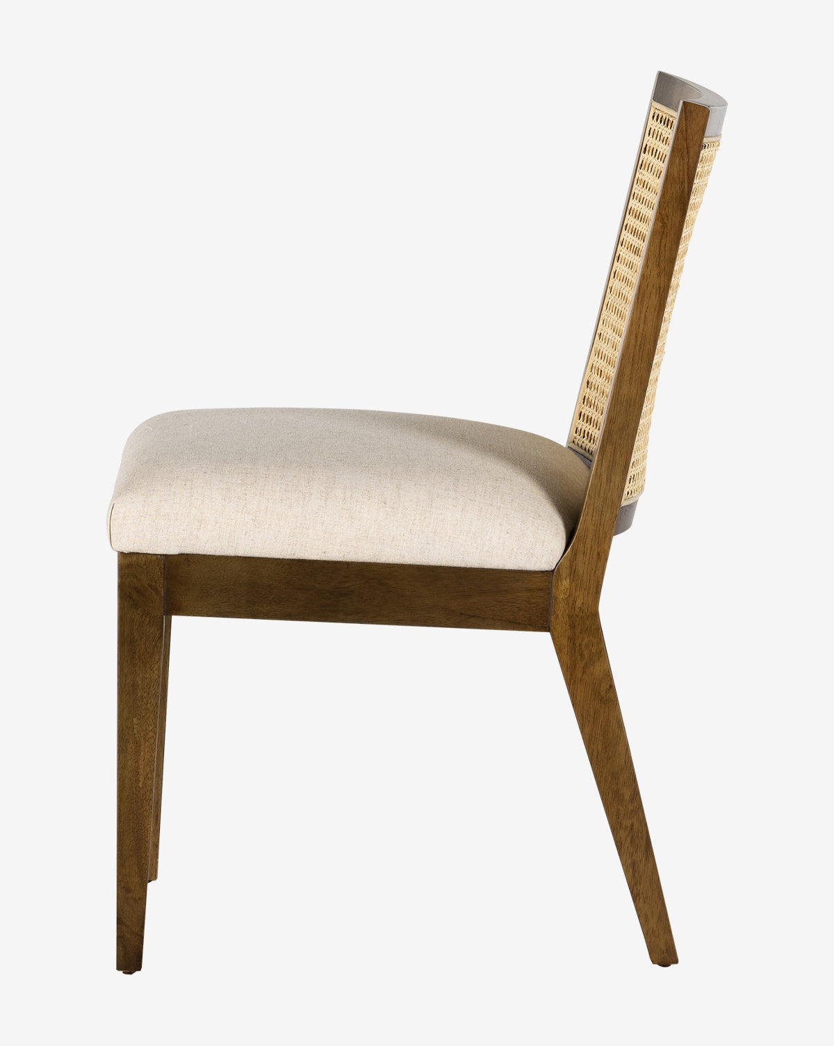 Side view of the Landon Dining Chair, showcasing a high-performance beige upholstered seat and a refined cane-backrest design, by McGee & Co.