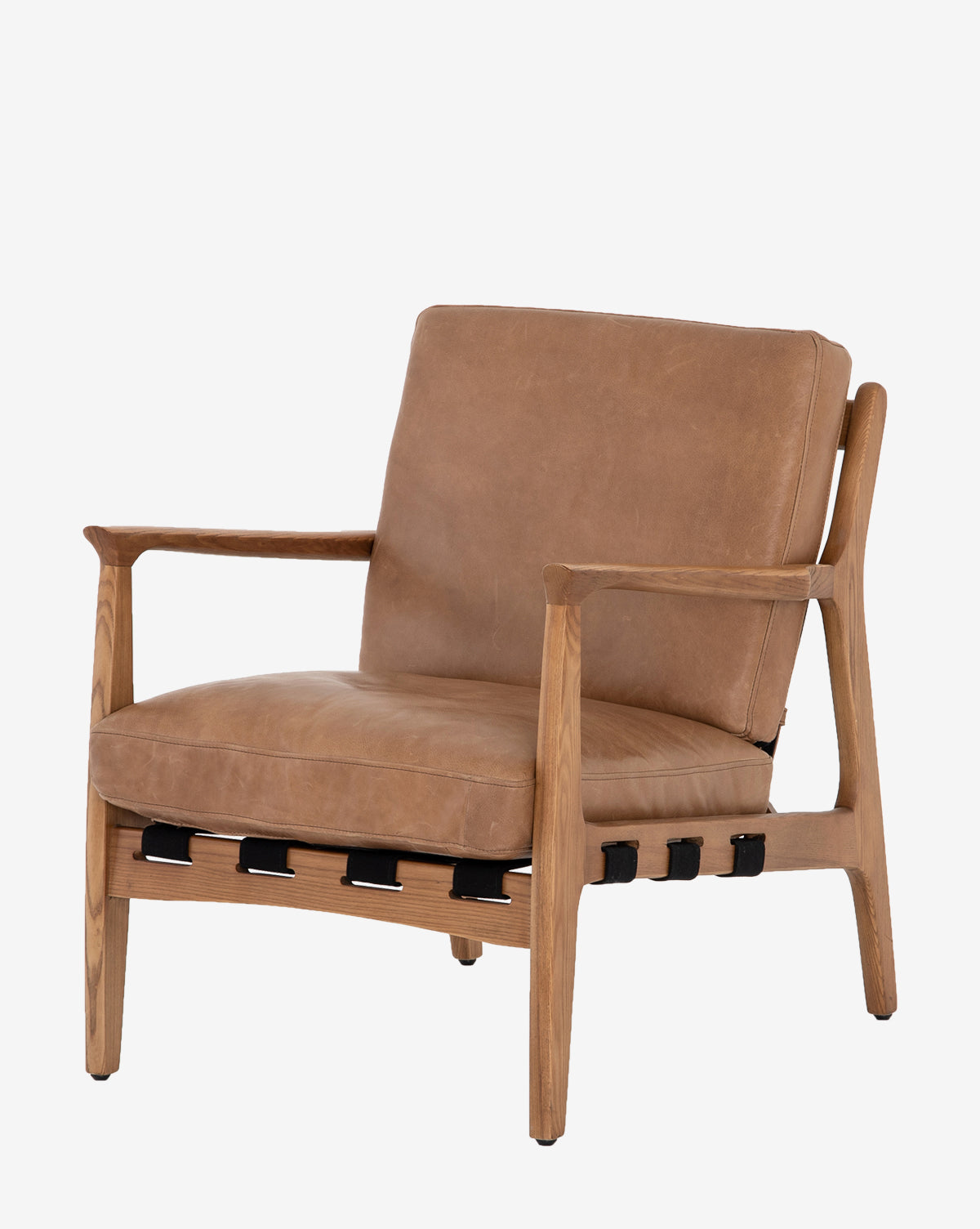 The Lanston Lounge Chair is a modern accent chair with light brown leather cushions, an ash wood frame, armrests, and visible black straps under the seat. Shown against a plain white background.