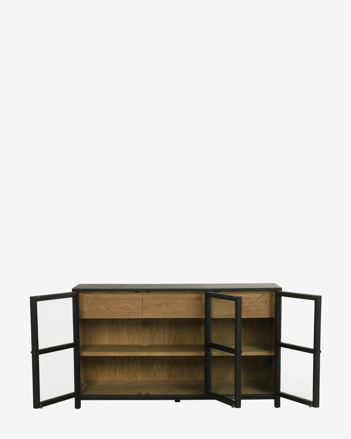 The Laura Sideboard features a black frame and oak body with a natural drifted finish, two glass doors, two shelves, and two upper drawers—blending elegance and functionality.