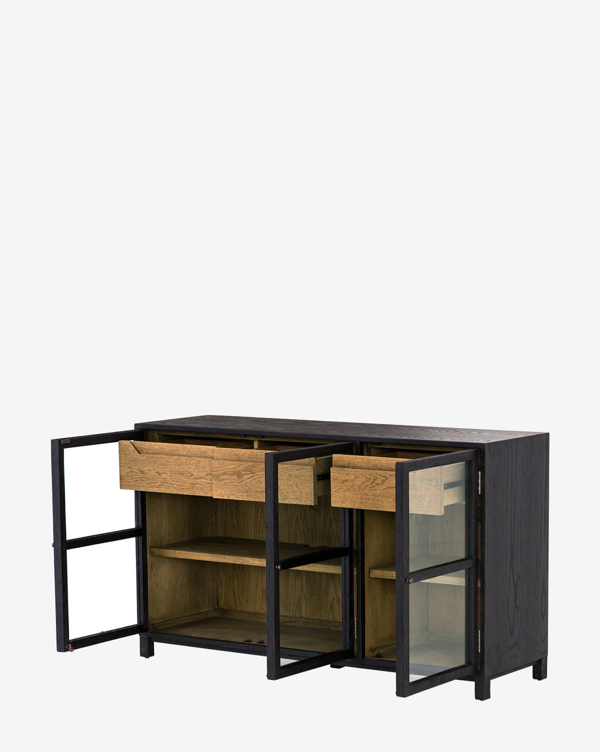 The Laura Sideboard features a modern oak design with a dark frame, glass doors revealing interior shelves, and two top wooden drawers in a natural drifted finish that are partially pulled out.