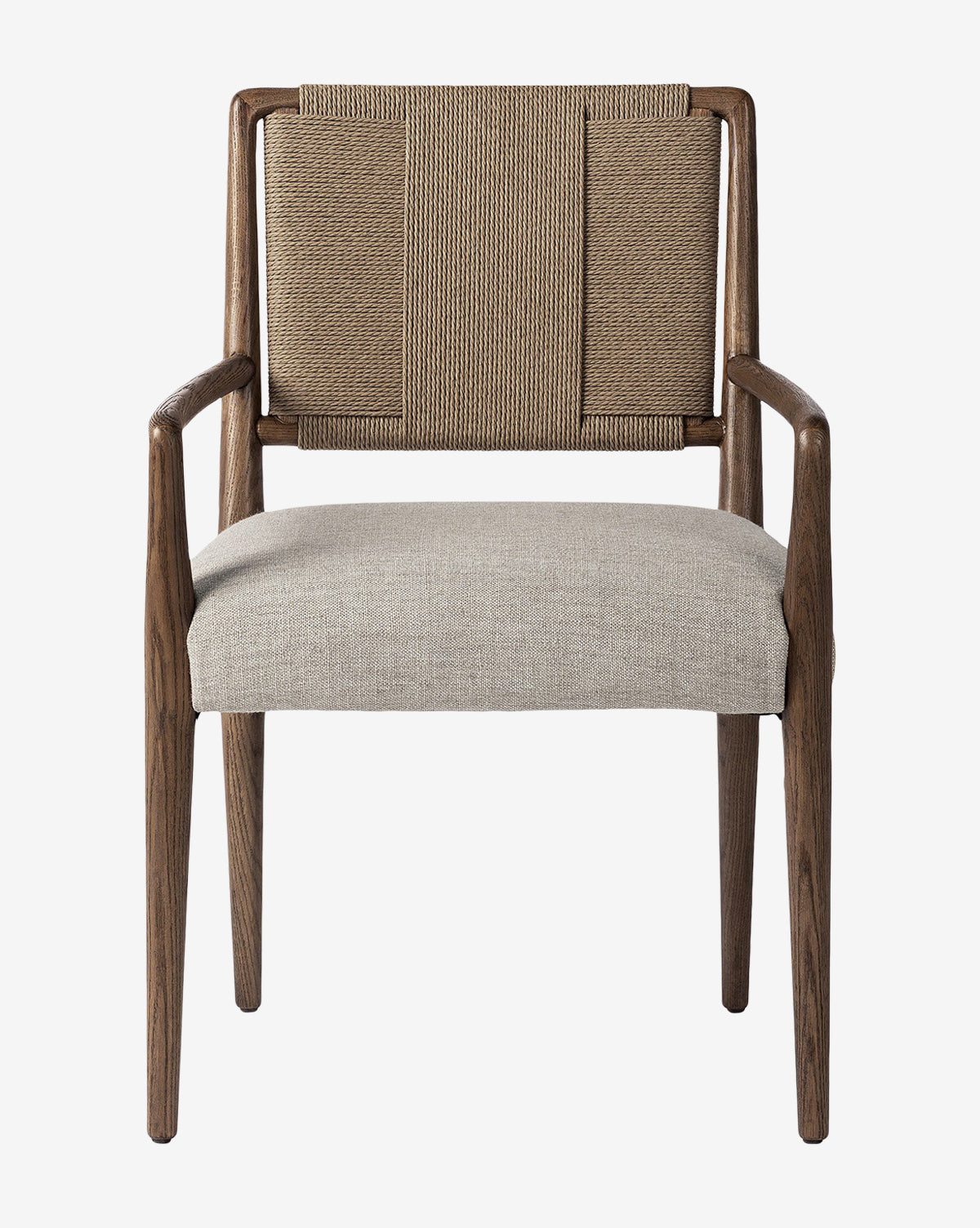 The Leola Dining Armchair features a modern oak frame, light brown upholstered seat, rush-woven backrest, and slim curved armrests, all displayed against a plain white background by McGee & Co.