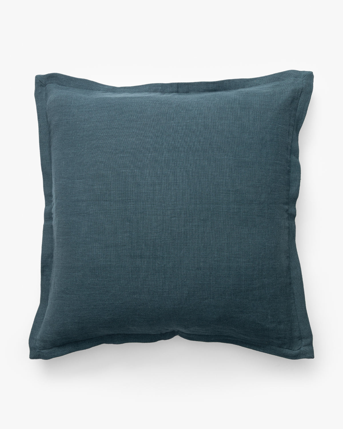 The Liam Double Flange Pillow Cover features a square shape in dark blue linen with a visible fabric texture and slightly wrinkled edges, displayed on a plain white background by McGee & Co.