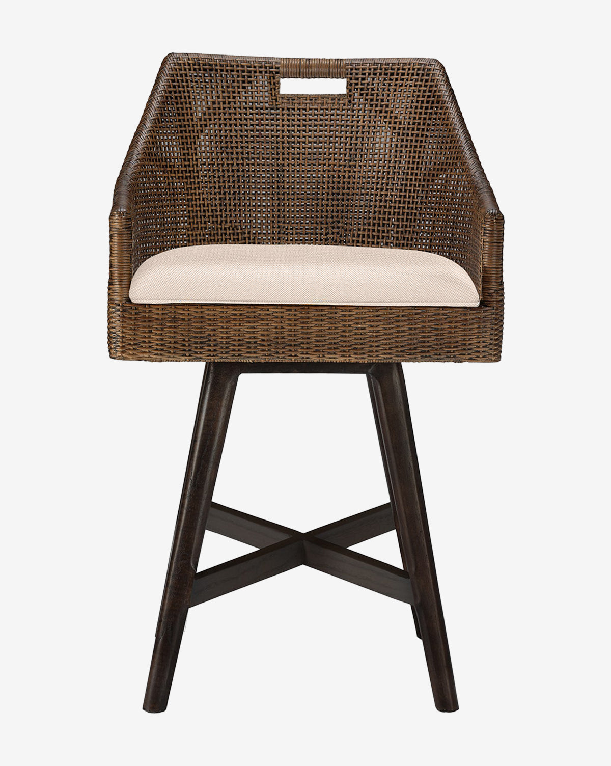 The Lilian Counter Stool by Made Goods features a brown rattan frame, beige upholstered seat, angled armrests, and dark wooden legs, displayed against a plain white background. McGee & Co.