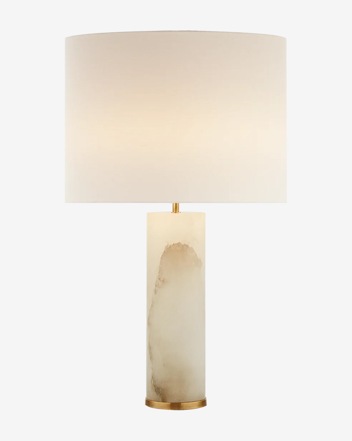 The Lineham Table Lamp by Visual Comfort & Co. Signature features a cylindrical white marble base with natural veining, a gold accent, and a large white drum shade—an elegant addition to any room. McGee & Co.