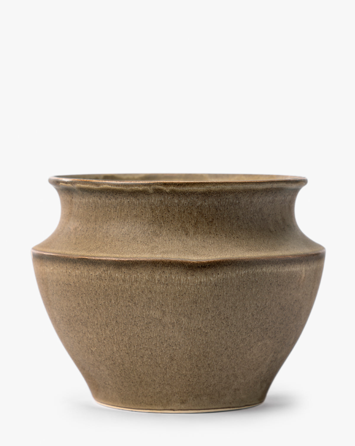 The Liora Pot is a round, brown ceramic vessel with a wide neck and a subtle ridge at its center, shown against a plain white background, by McGee & Co.