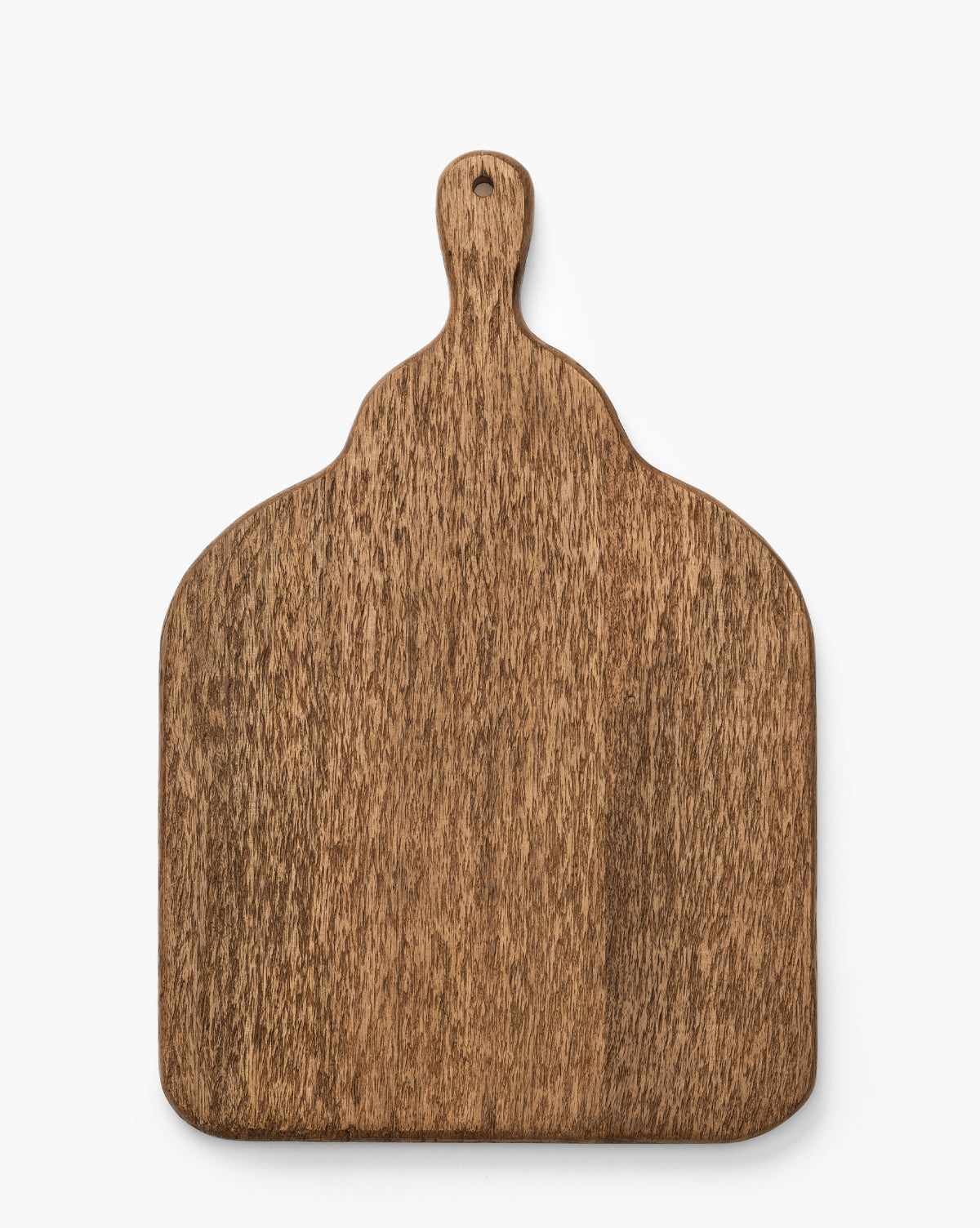 The Longfellow Breadboard, crafted from mango wood with a handle, rounded top edges, and a hanging hole, offers stylish serving and practical kitchen decor against a plain white background by McGee & Co.