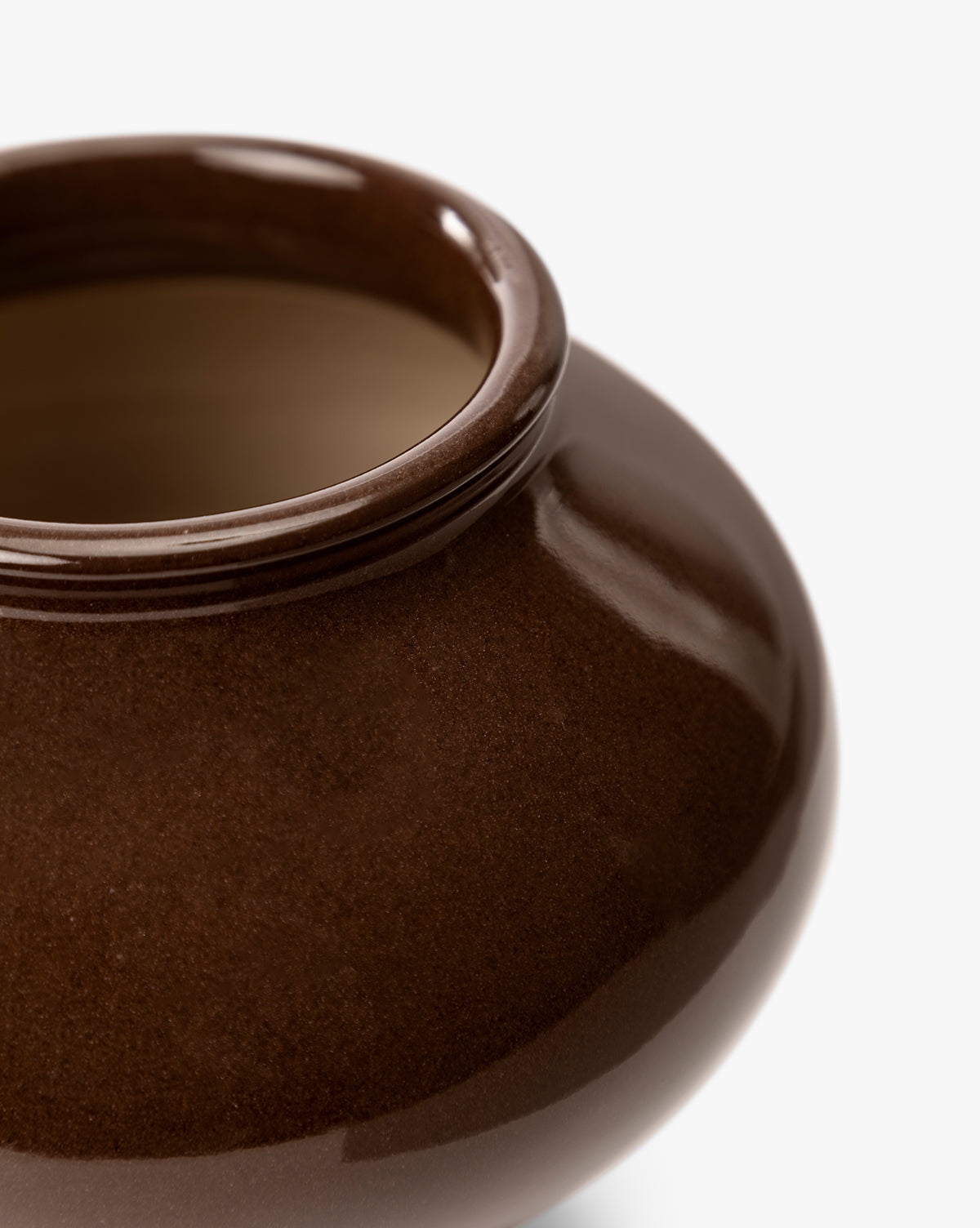 Close-up of the Louis Vase, featuring a glossy, round brown design with a wide opening—ideal for modern home decor—set against a plain white background, by McGee & Co.