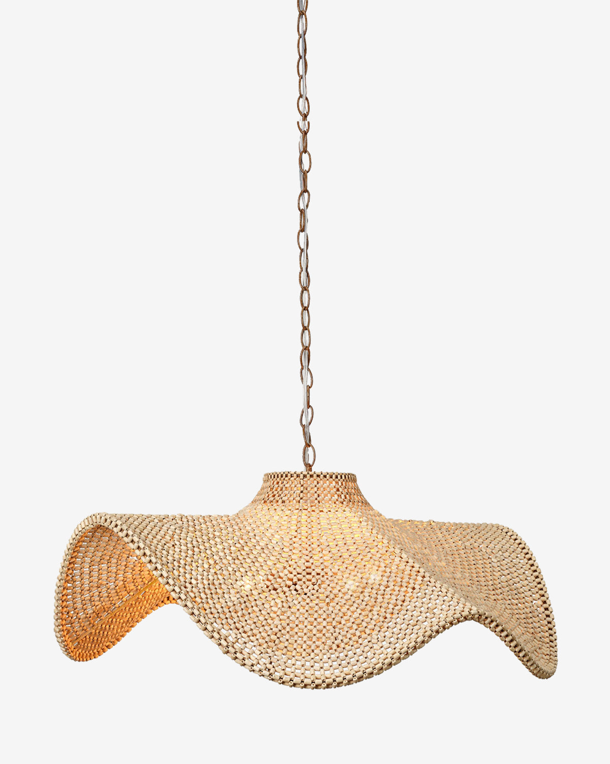 The Lourdes Chandelier by Made Goods features a woven rattan, wavy sculptural shade with natural wood beads, hanging from a metal chain. This pendant emits a warm, soft glow through its natural materials. McGee & Co.