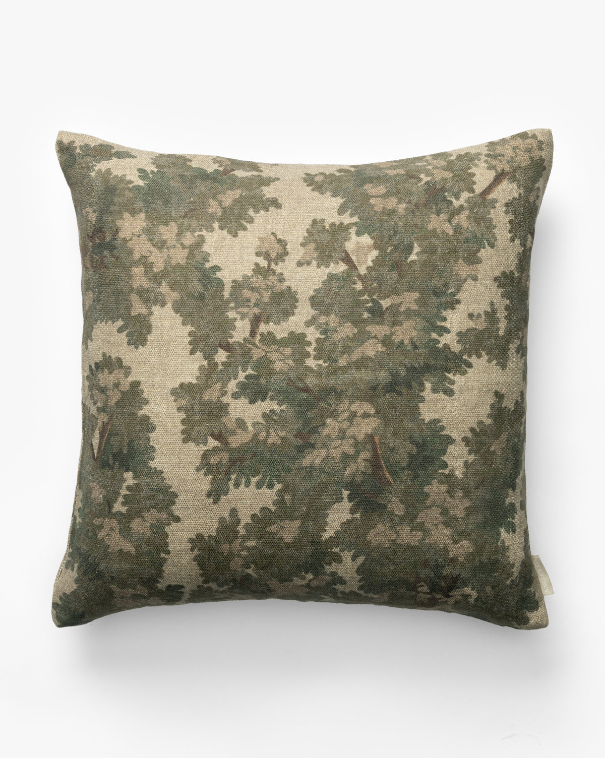 The Lucetta Pillow Cover features a beige background with a green leafy tree branch pattern, bringing earthy tones and nature-inspired style to your space against a crisp white surface, by McGee & Co.