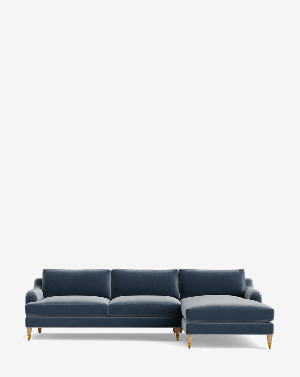 The Lucille English Roll Arm Right Chaise Sectional 107 features a modern L-shaped design with blue upholstery, three down-wrapped cushions, and wooden legs, displayed against a plain white background, by McGee & Co.