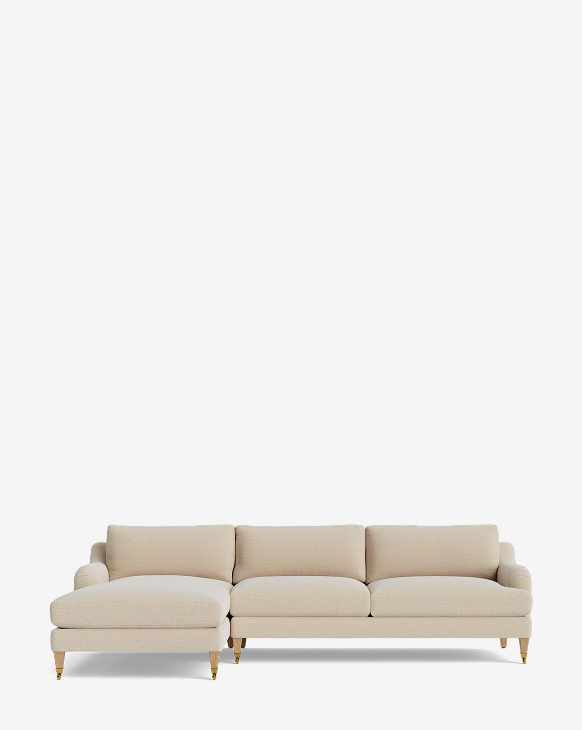 The Lucille English Roll Arm Left Chaise Sectional 107 by Community features three seat and back cushions, a customizable chaise, wooden legs with brass caps, and down wrapped cushions in beige, set against a white background. McGee & Co.