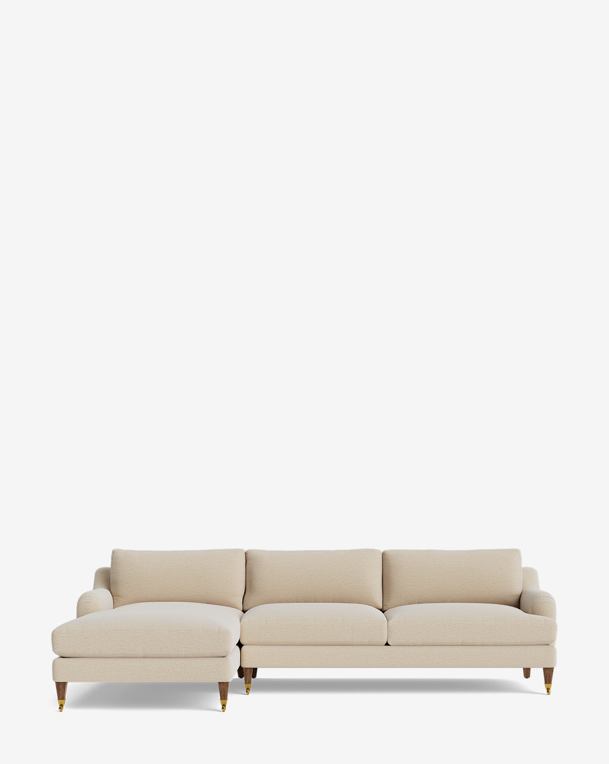 The Lucille English Roll Arm Left Chaise Sectional 107 by Community features three down-wrapped cushions, a left-side chaise, beige upholstery, and light wooden legs with brass castors, shown against a white background. McGee & Co.