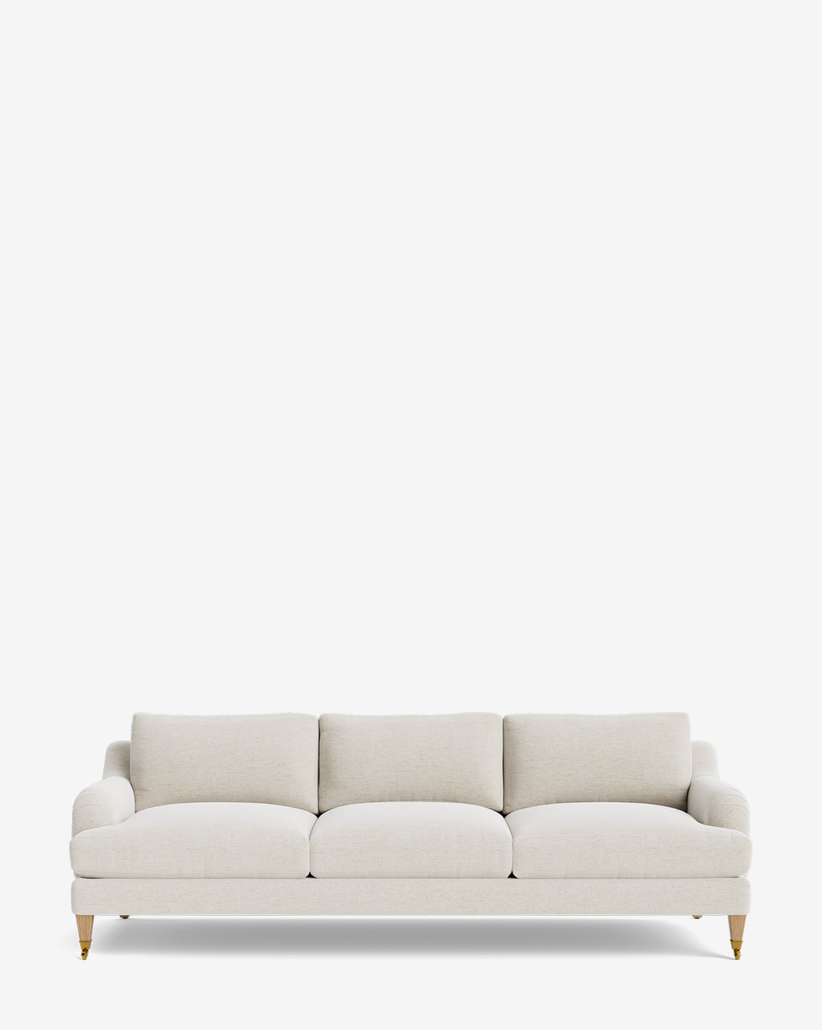 The Lucille English Roll Arm Sofa 90.5 features light beige upholstery, plush down-wrapped cushions, and slim wooden legs with brass caps, presented against a plain white background by McGee & Co.