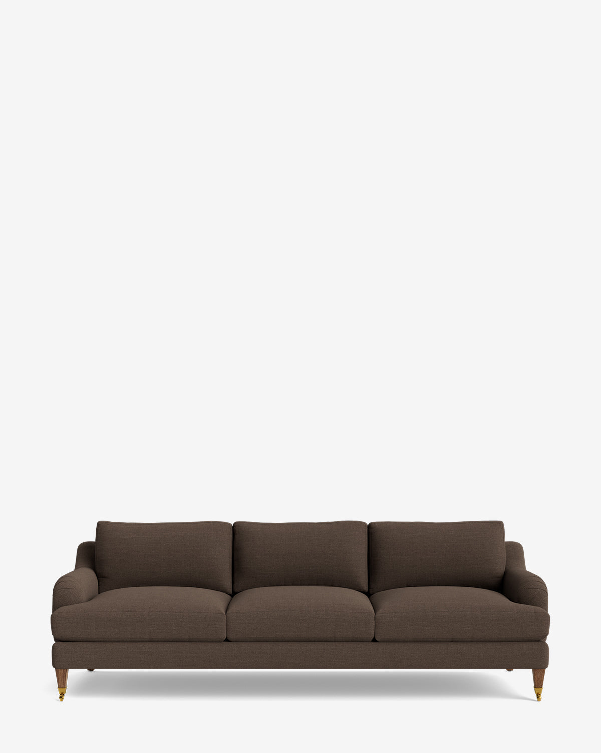 The Lucille English Roll Arm Sofa 90.5 in dark brown features three down-wrapped seat and back cushions, low arms, and wooden legs with brass castors, set against a white background—a customizable piece for any living space by McGee & Co.