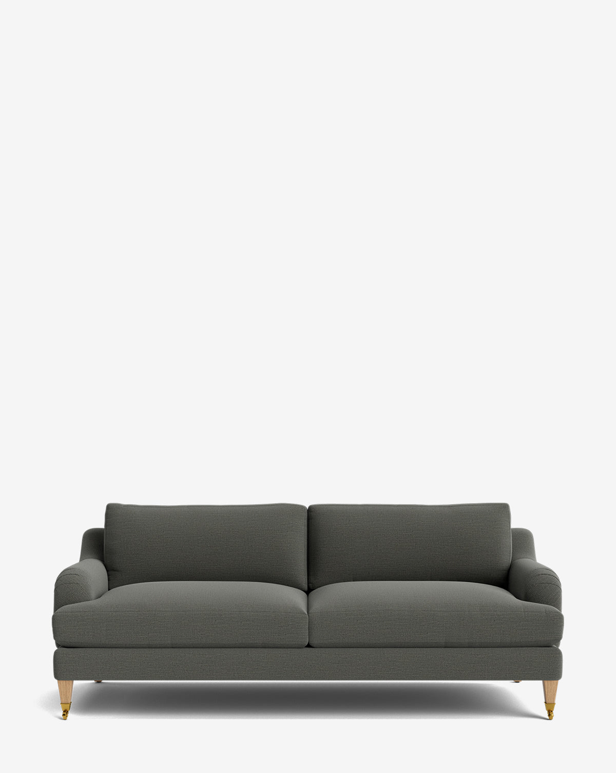 The Lucille English Roll Arm Sofa 78 is a modern dark gray piece with two down-wrapped seat cushions, low rounded arms, and light wooden legs with brass castors, all set against a plain white background by McGee & Co.