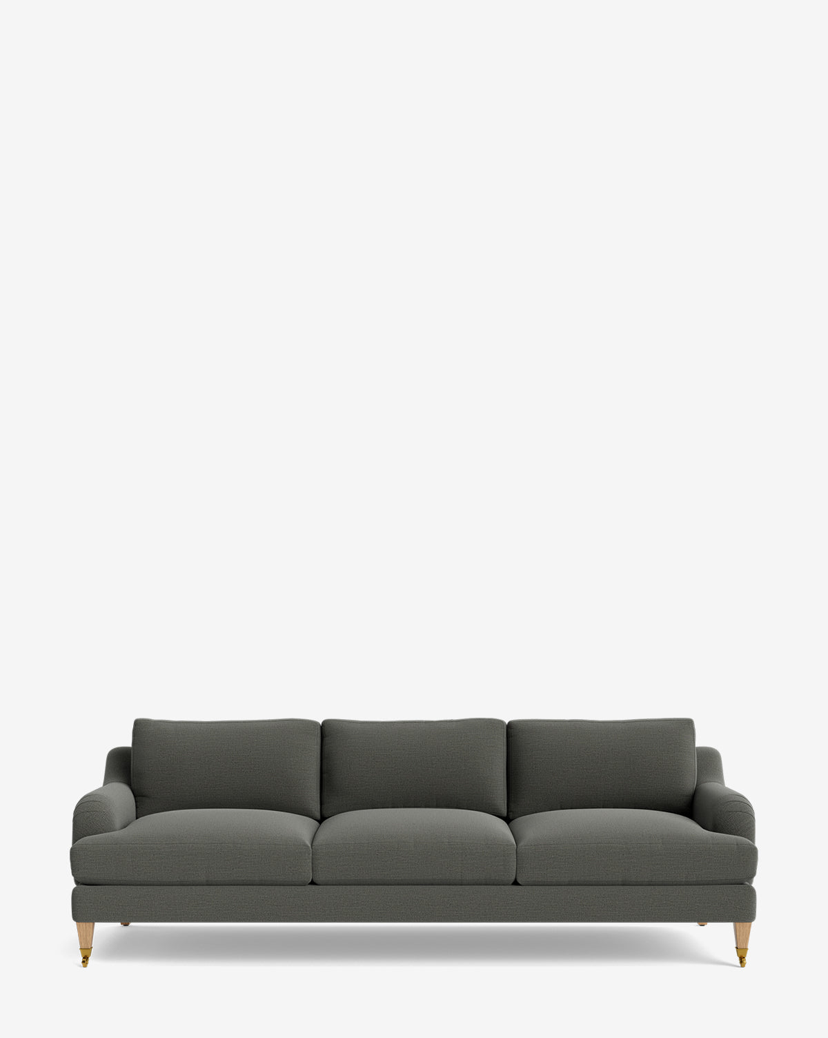 The Lucille English Roll Arm Sofa 90.5 is a dark gray, three-seater with down-wrapped cushions and wooden legs with brass caster wheels, shown against a plain white background by McGee & Co.