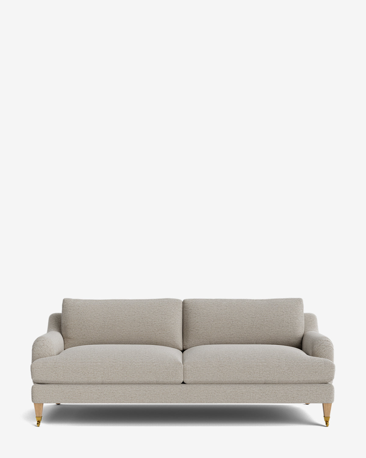 The Lucille English Roll Arm Sofa 78 is a light beige, upholstered sofa with two seat and back cushions, down-wrapped for comfort, and wooden legs with brass casters, shown against a plain white background by McGee & Co.