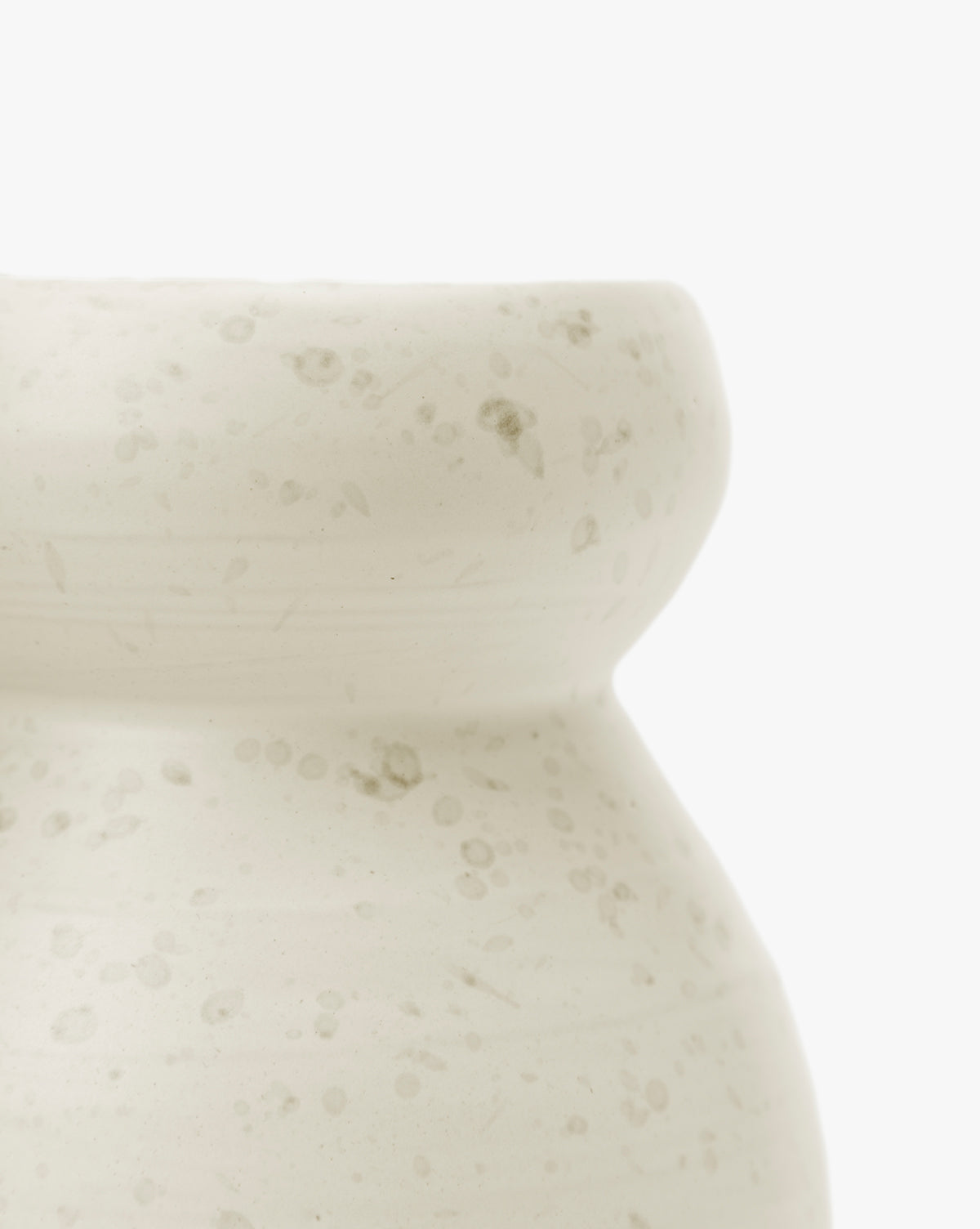 Close-up of the Lyra Vase, a modern light beige ceramic piece with a speckled texture, showcasing its neck and upper body against a plain white background, by McGee & Co.