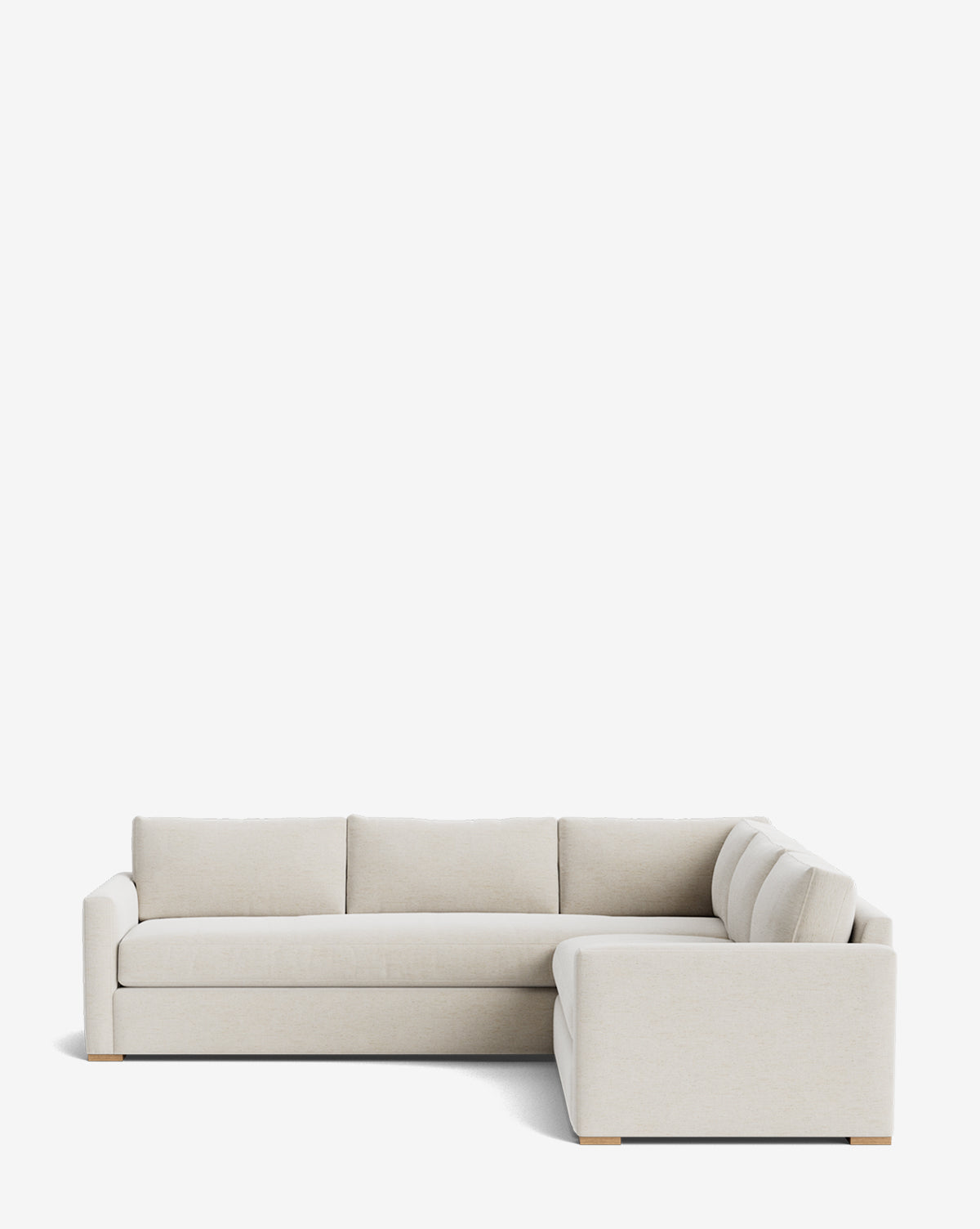 The Community Macy Upholstered L Sectional 108 is a beige sofa with down-wrapped cushions, three seat and back cushions, and low arms, shown against a plain white background. McGee & Co.