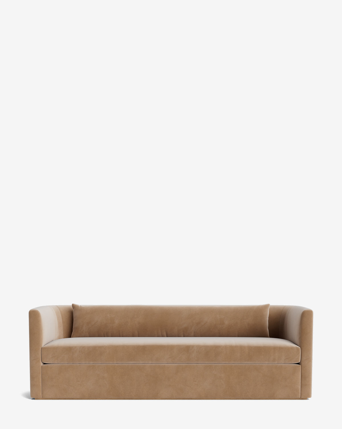 The Community Reese Sofa (84-96) showcases a modern tan velvet design with straight arms, a low backrest, plush down-wrapped cushions, and handcrafted alder wood accents, presented on a white background. McGee & Co.