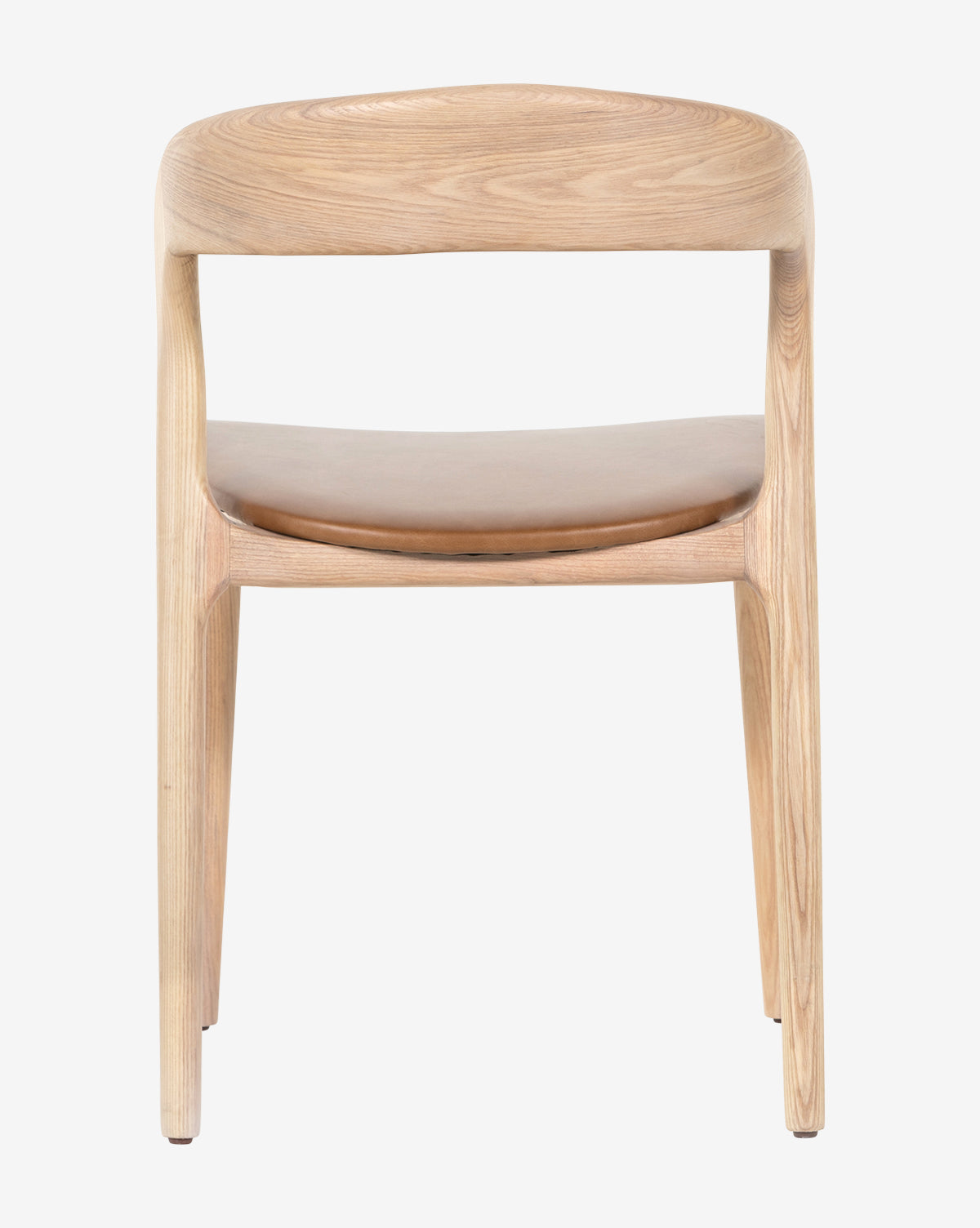 The Lucinda Dining Chair features a modern Scandinavian design with a curved open backrest and smooth wooden seat, shown from the front against a plain white background, by McGee & Co.