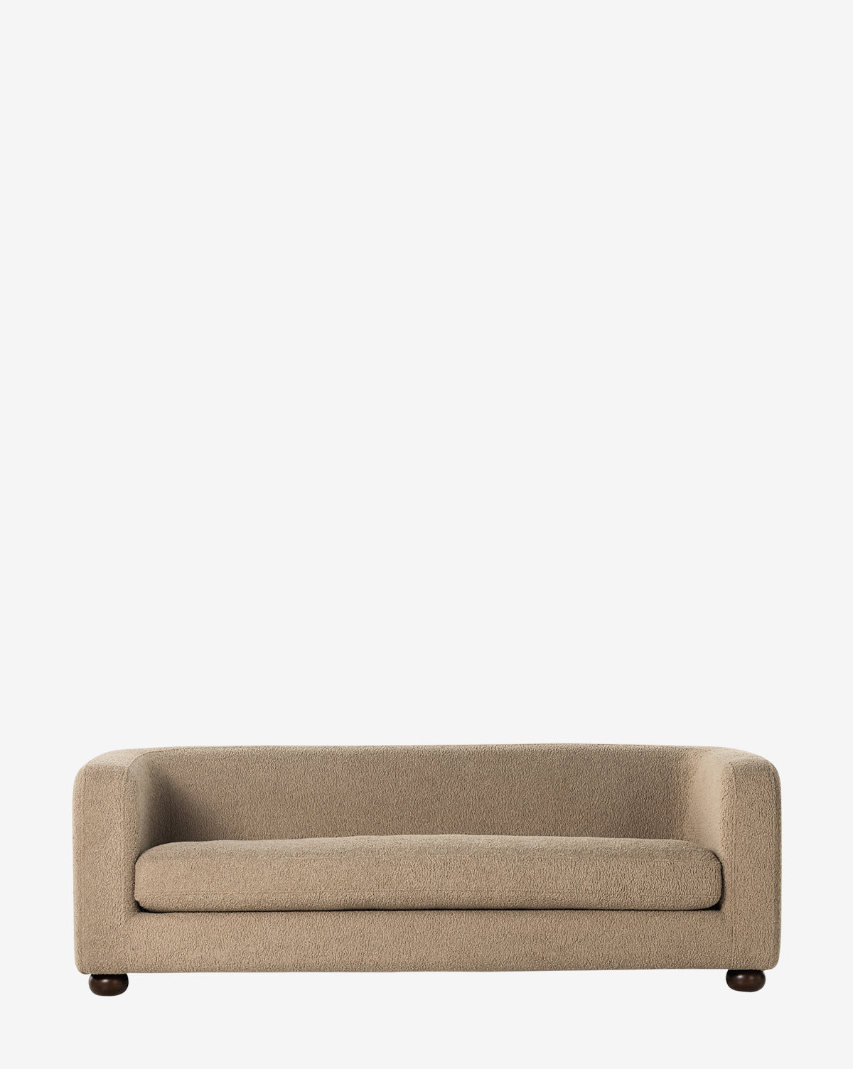 The Four Hands Quill Sofa 84 in beige features modern design with rounded arms and a plush seat cushion, shown against a plain white background. McGee & Co.